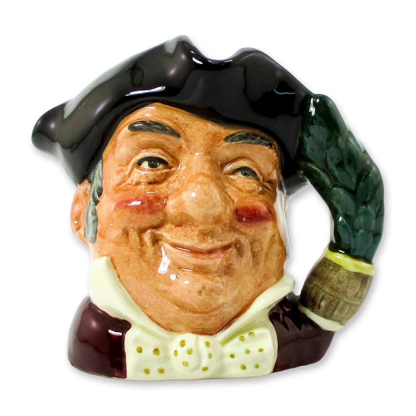 Mine Host D6470 - Small - Royal Doulton Character Jug: Black tricorn; red coat; white bow tie with gold spots. The forerunner of today's English publican, this cheerful man would hang a pine bough on the door of his home to let travelers know that refresh