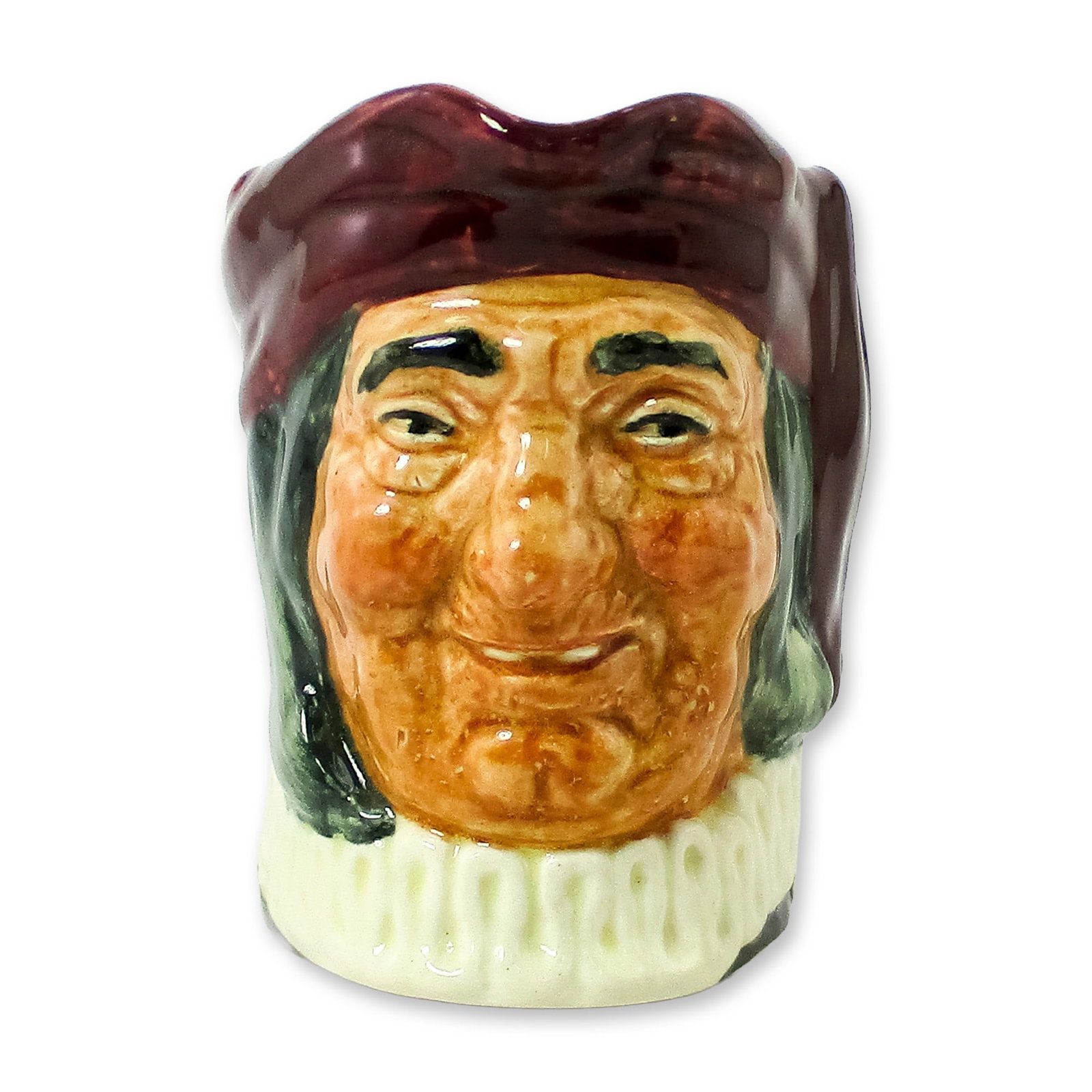 Simon the Cellarer D5616 Small Royal Doulton Character Jug: Maroon hat; white ruff. Simon was the subject of a 19th century English folksong. The keys on the handle are those to his cellar, full of great wines and ales. He was always good for standing a drink 