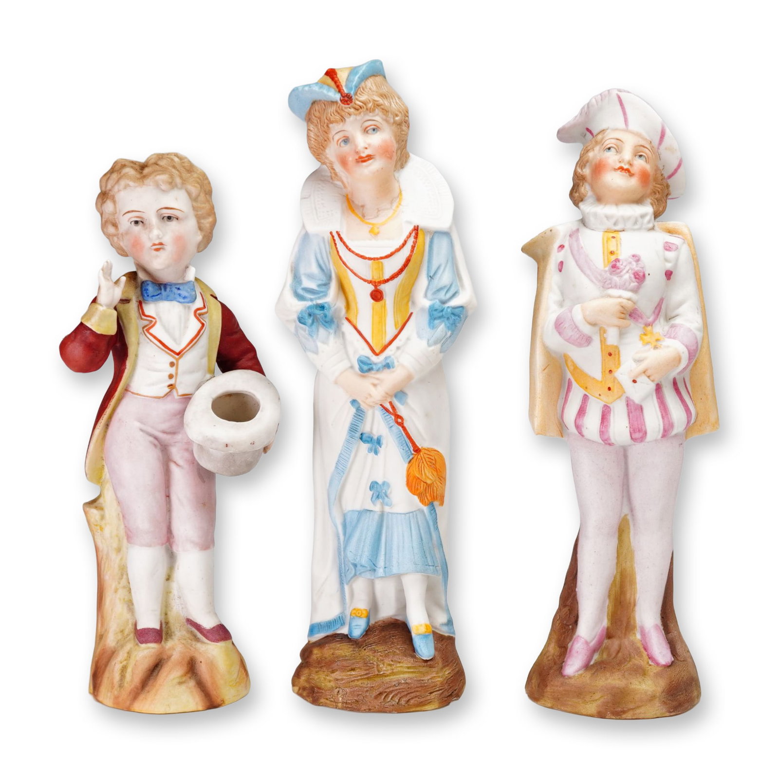 3pc German Style Hand-Painted Bisque Porcelain Victorian Figurines: This collection consists of three Victorian-style bisque porcelain figurines, likely of German origin, each molded and hand-painted with a matte finish. The ensemble features a young boy in a red froc