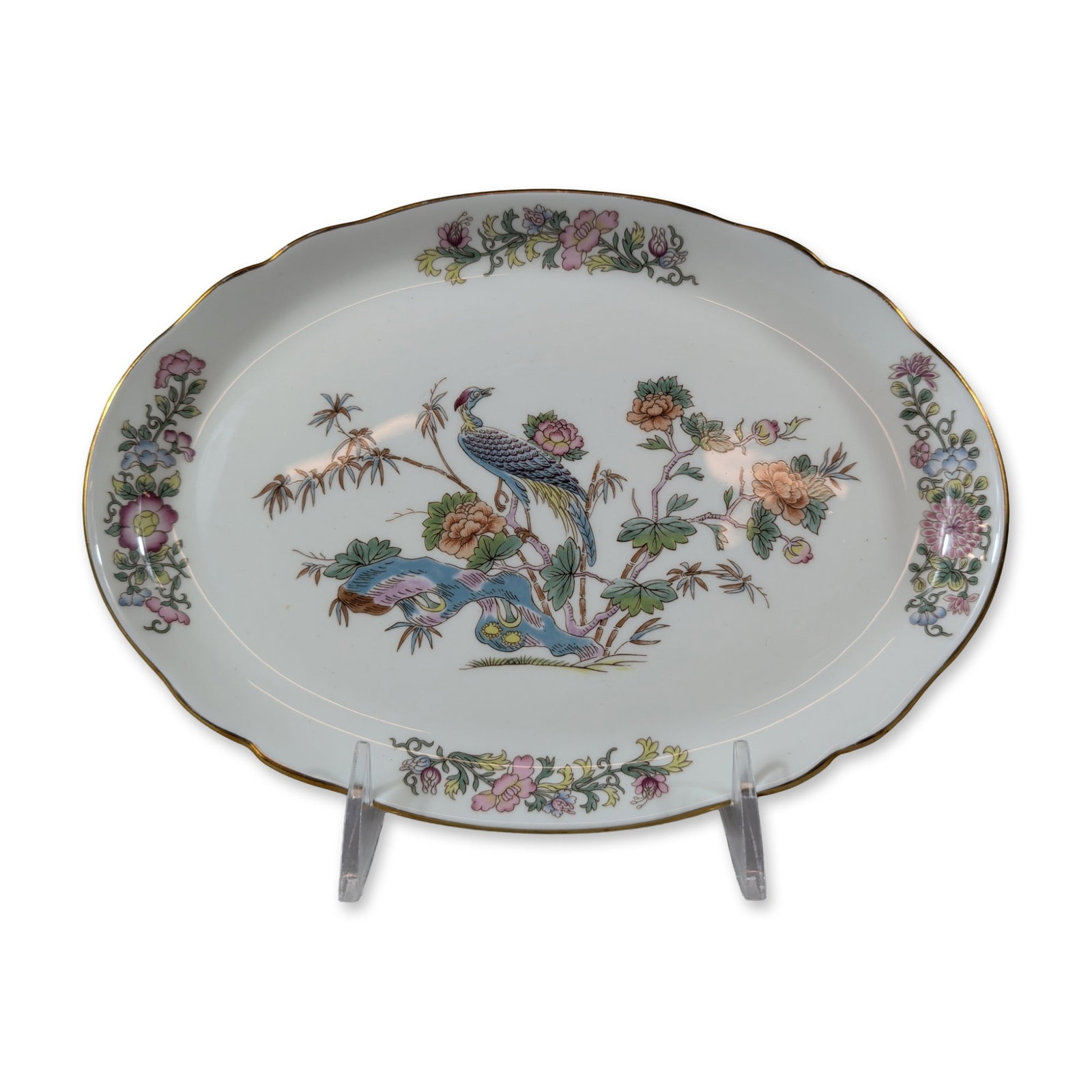 Wedgwood England Bone China Oval Dish, Kutani Crane: Wedgwood, England. Oval dish in bone china, featuring the Kutani Crane pattern executed in polychrome transfer print with hand-painted enamel highlights. The design depicts a central crane among flowe