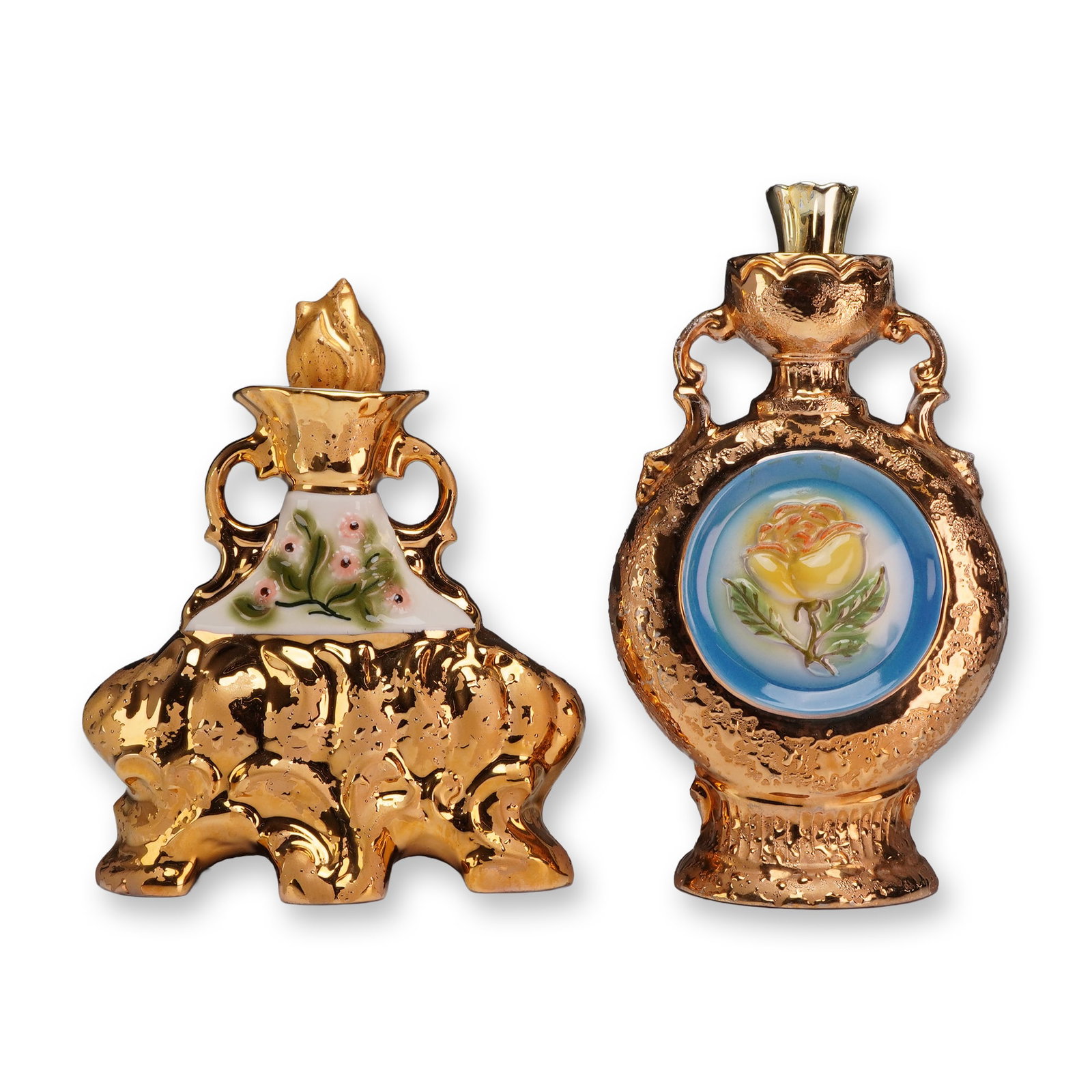 Two Regal China Gold Decorated Porcelain Liquor Bottles for James B. Beam Distilling Co.: This lot consists of two vintage ceramic liquor decanters produced in 1970 by the Regal China Corporation for the James B. Beam Distilling Co. Both vessels are finished in a heavily textured gold lust
