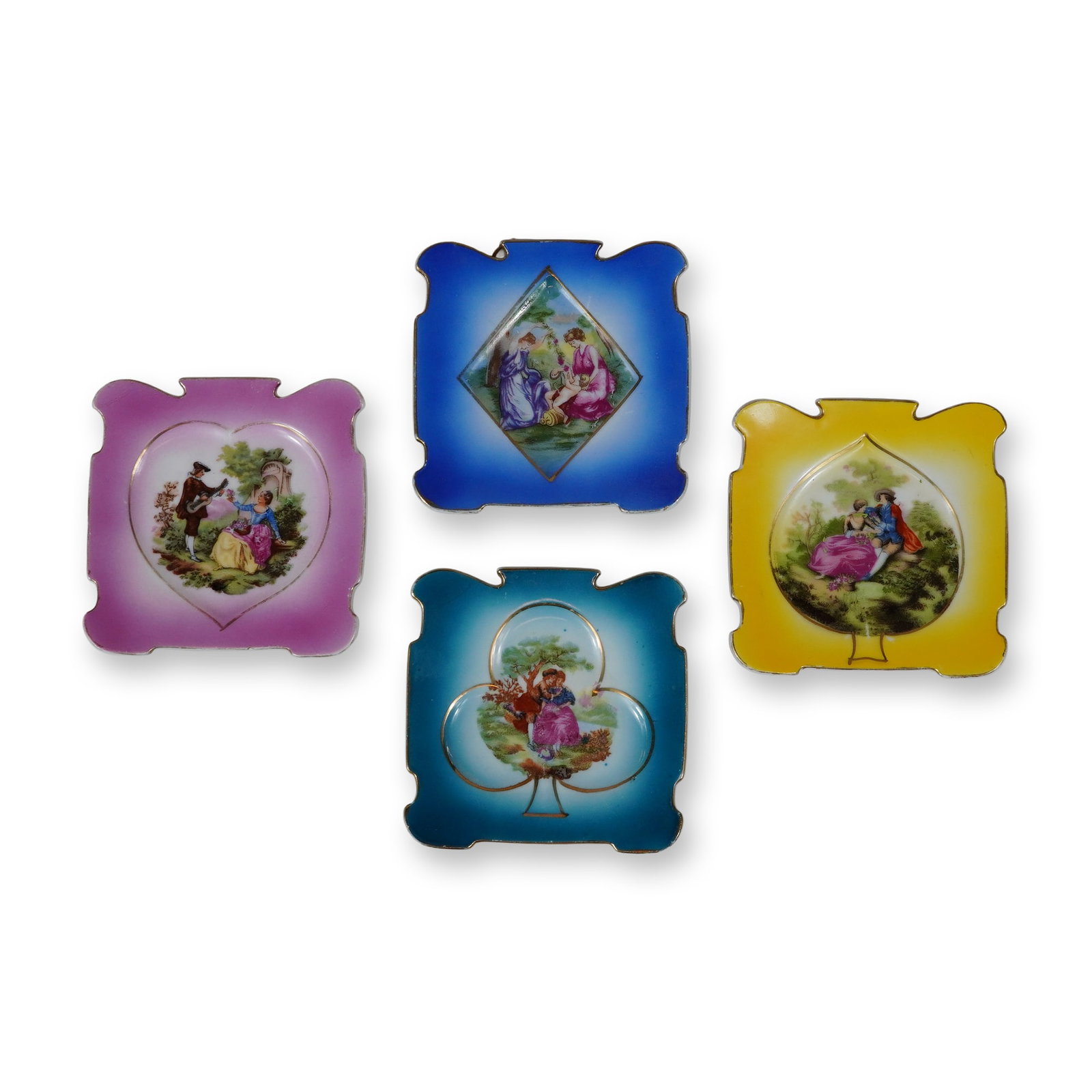 4pc Royal Sealy China Porcelain Wall Plaques: This set of four porcelain wall plaques or trinket dishes was manufactured by Royal Sealy China in Japan. Each dish is designed with a square form featuring lobed edges and indented corners. The centr