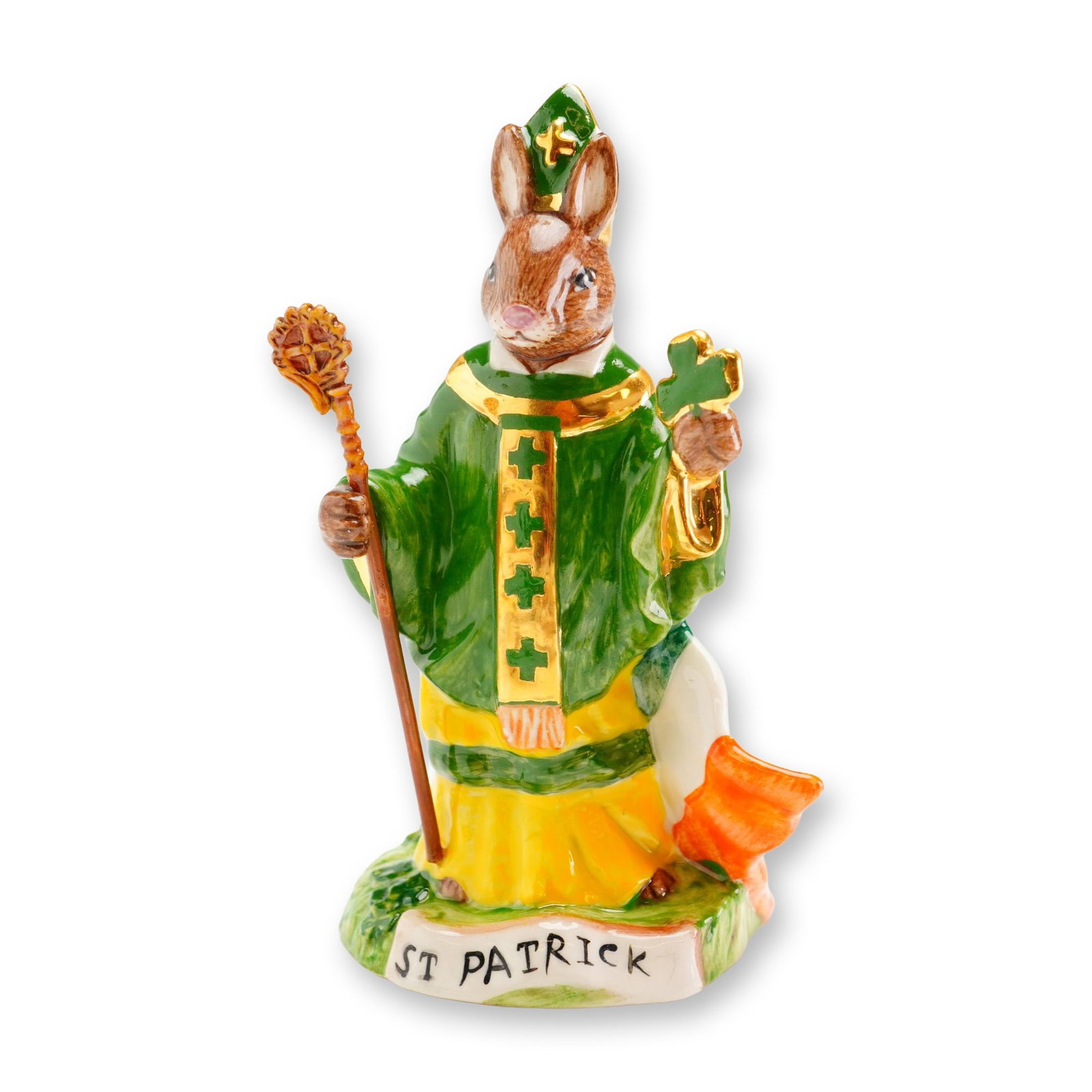 Royal Doulton Prototype Bunnykins Figurine, St. Patrick: An exceptional and highly sought-after Royal Doulton Bunnykins prototype portraying the rabbit interpretation of Ireland's patron saint. Beautifully hand-painted, the figure wears a green mitre decora