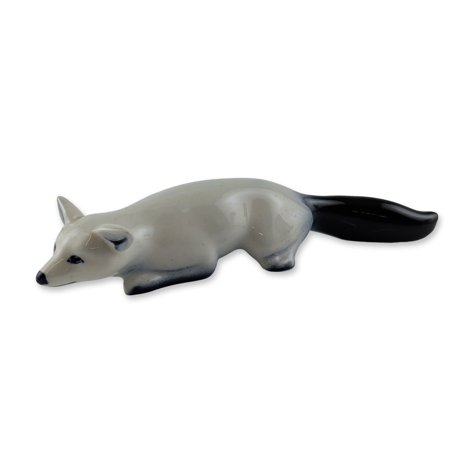 Royal Doulton Blue Flambe Porcelain Figurine, Stalking Fox: Royal Doulton porcelain animal figurine depicting a stalking fox, executed in a blue and white flambe colorway. The model features a low-profile prowling pose with the tail raised, finished in a high-
