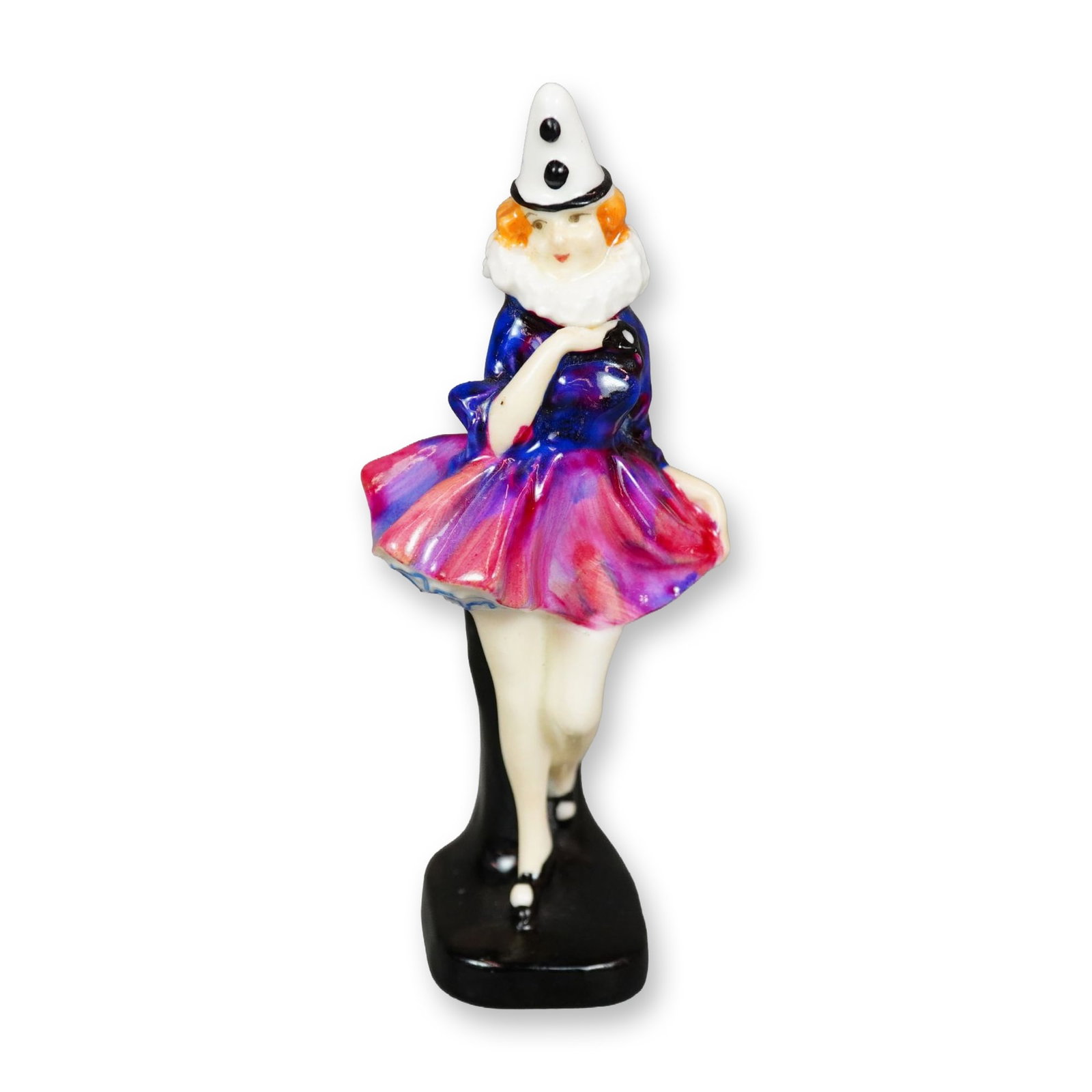 Doulton Colorway Miniature Figurine, Pierrette: A porcelain figure of a young lady dressed as a Pierrot. Black and white hat, and a purple and pink dress. Doulton stamped. Dimensions: 1.5"L x 1.5"W x 3.75"H Manufacturer or Brand: Doulton Country