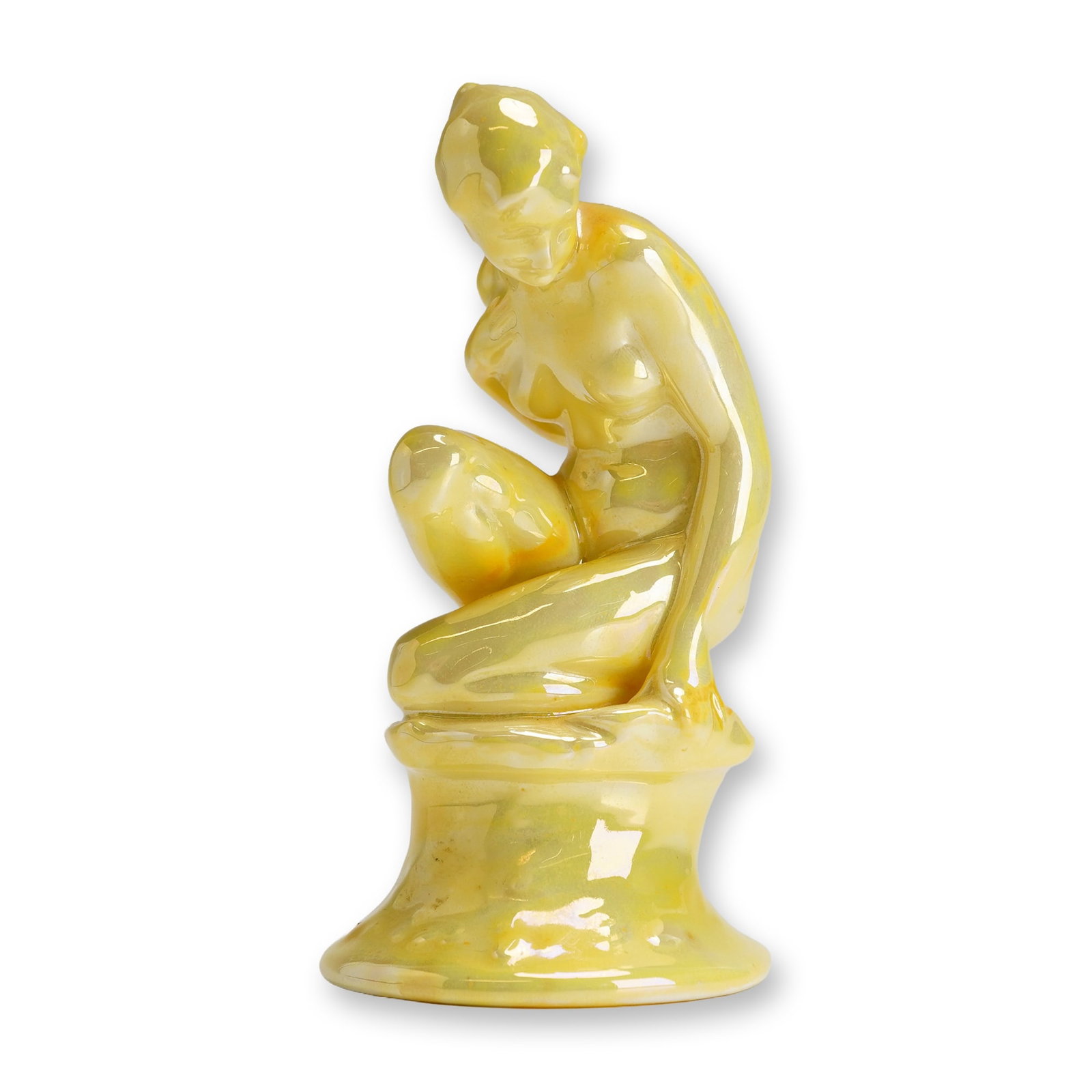 Royal Doulton Experimental Lustre Glaze Porcelain Figurine, Female Study HN604: Finished in a yellow lustre glaze, the figure portrays a kneeling woman gazing over the edge. While Female Study HN604 was also issued in versions decorated with floral detailing, this plain example w