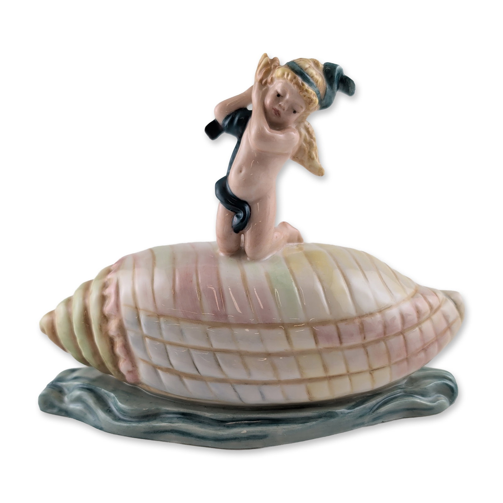Royal Doulton Prototype Porcelain Figurine, Child on Shell #2: Depicting a winged cherub reclining atop a large spiral seashell. The shell features pastel bands of pink, yellow, and green and is set upon a base of stylized deep blue ocean waves. The base bears th