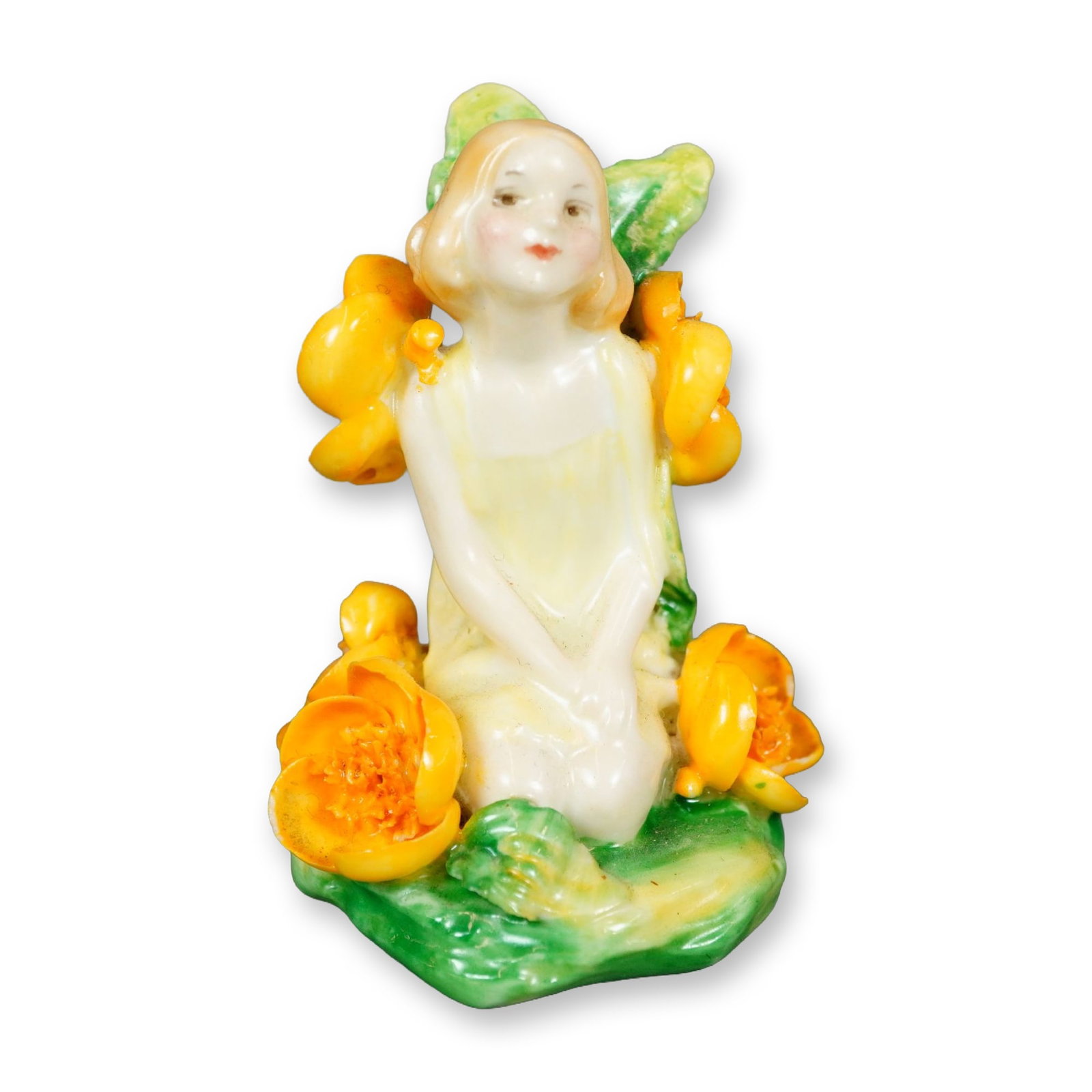 Doulton Porcelain Figurine, Fairy HN1378: Glazed porcelain modeled as a delicate fairy siting amongst orange flowers. Doulton England backstamp. Dimensions: 2.25"L x 2"W x 2.5"H Manufacturer or Brand: Doulton Country of Origin: England Weight