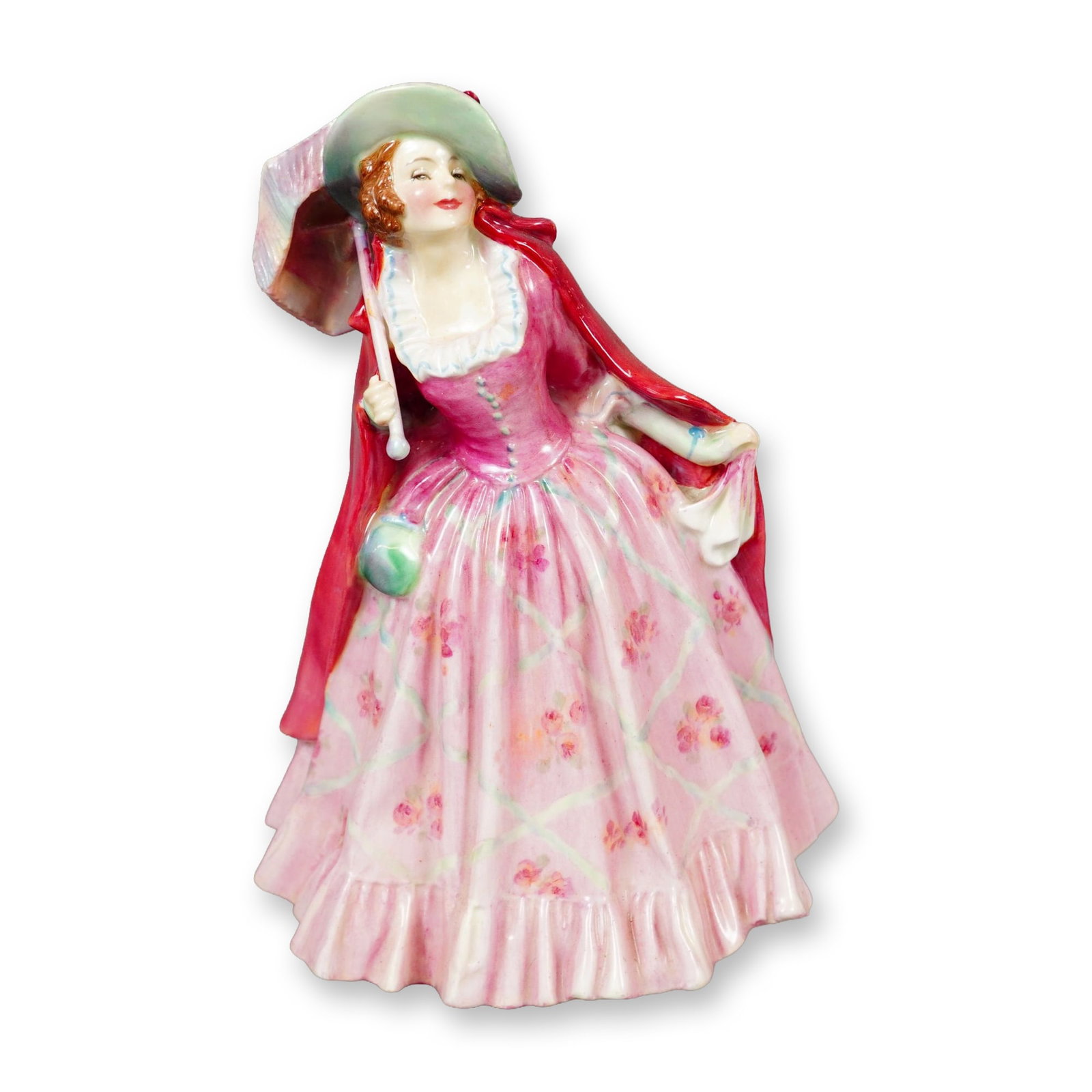 Royal Doulton Bone China Figurine, Mirabel HN1744: Part of the Harradine Classics collection. Designed by Leslie Harradine. Hand painted figure, depicts a woman in a pink gown with green accents and pink floral details. She is holding a parasol over h