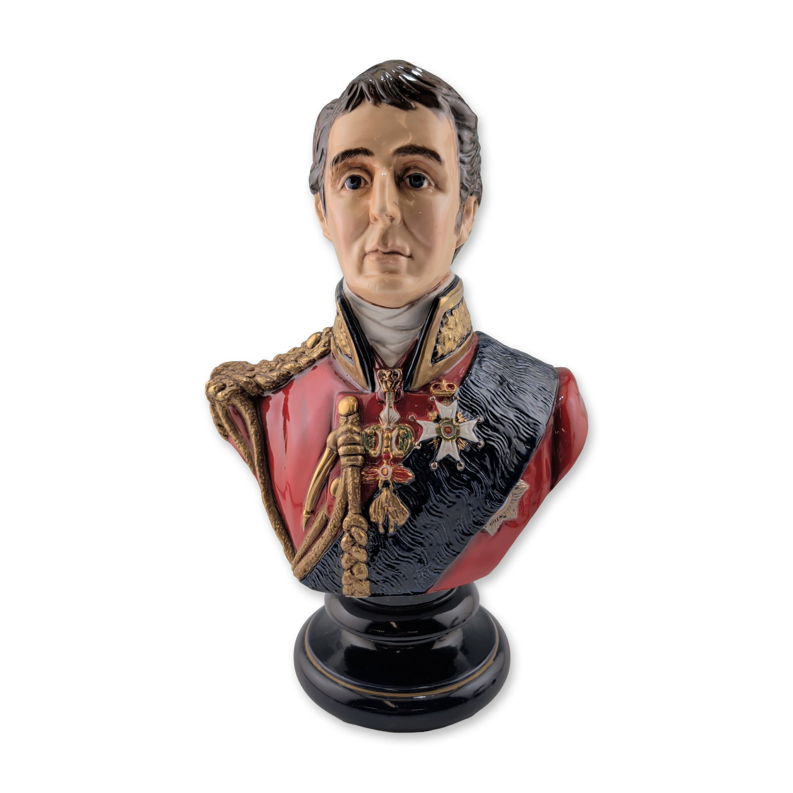 Michael Sutty Porcelain Bust, Duke of Wellington 1815: Limited edition. Hand-painted glazed porcelain portrait bust depicting Arthur Wellesley, the 1st Duke of Wellington in his 1815 military uniform. The figure is rendered in a high-collared red tunic wi