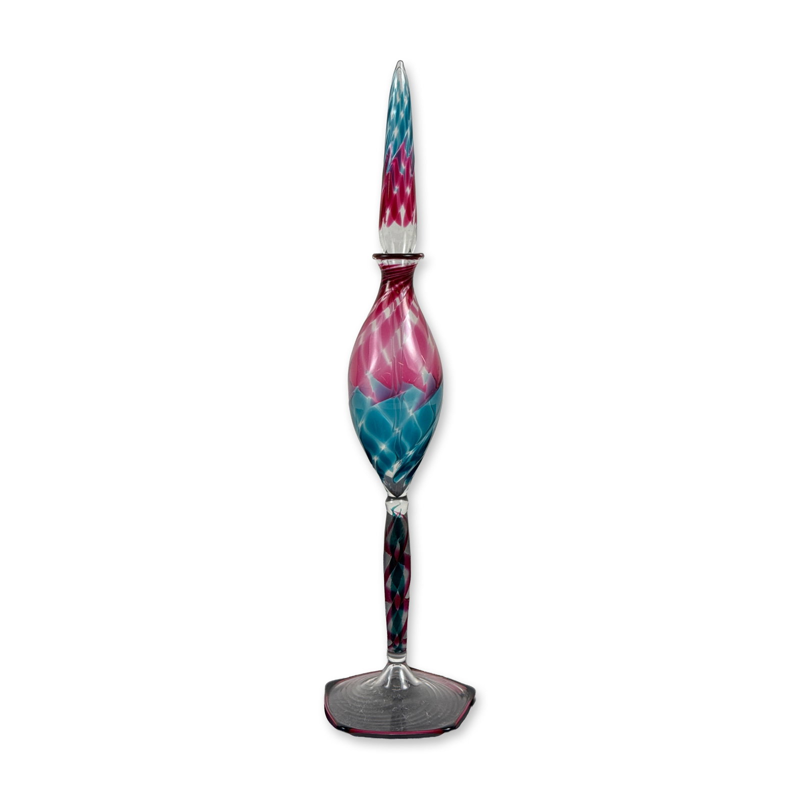 Studio Art Glass Pulled Feather Glass Perfume Bottle with Stopper: Hand-blown art glass perfume bottle featuring a bulbous body decorated with a pulled-feather pattern in magenta and turquoise. The form is supported by a twisted filigree stem containing pink, blue, a