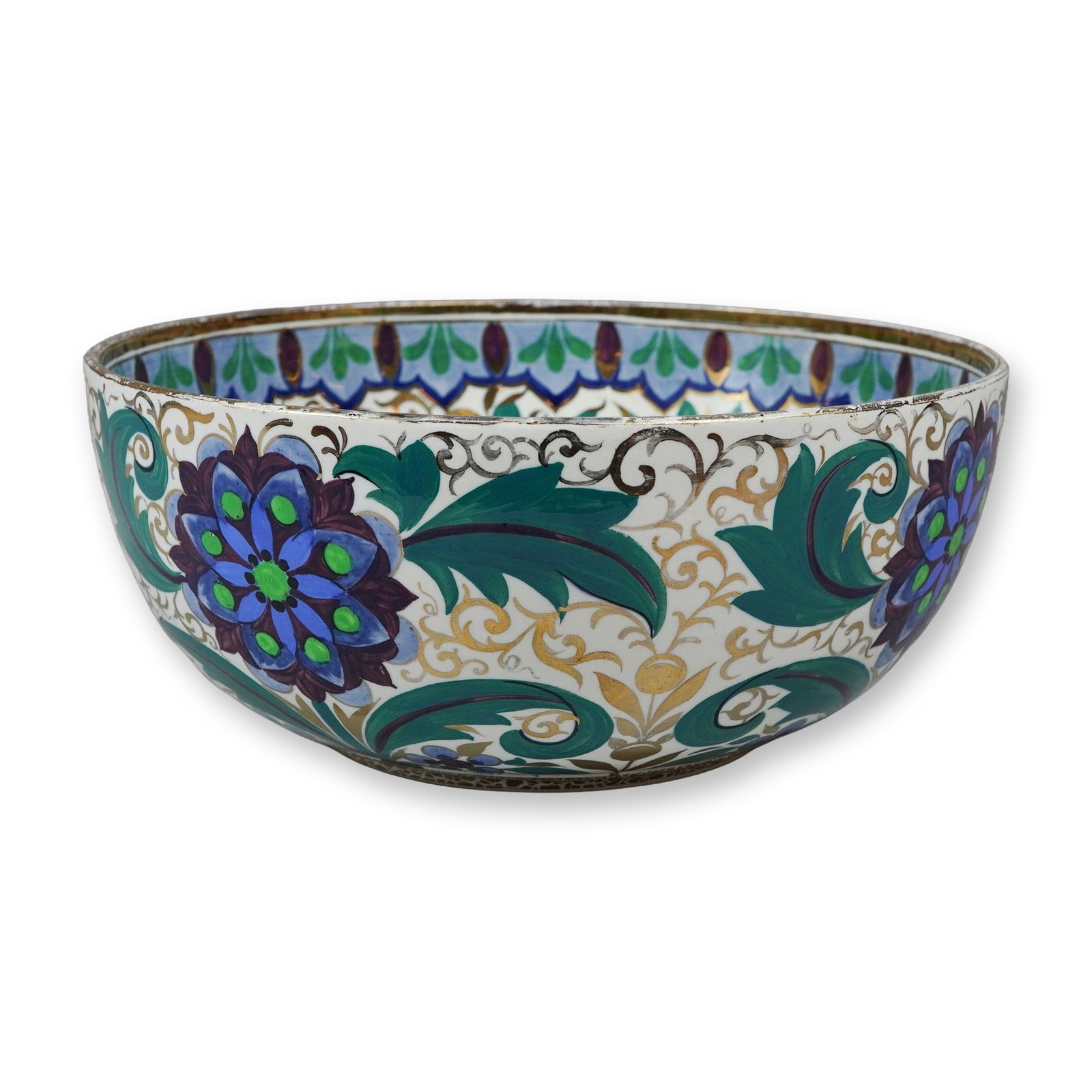 Wedgwood Rhodian Style Enamel Decorated Ceramic Bowl: This ceramic bowl is produced by Wedgwood and features decoration in the Rhodian style, which draws inspiration from 16th-century Iznik pottery designs. The decoration is applied using a technique int