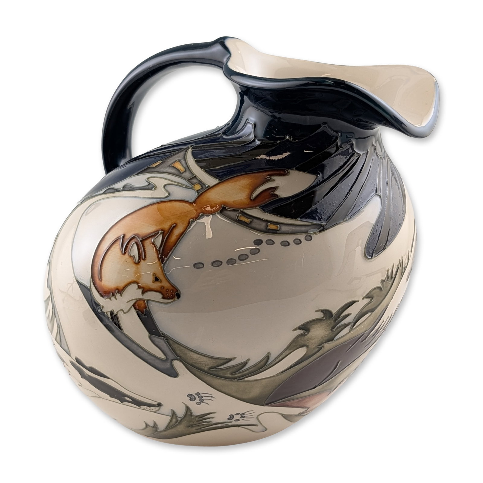 Moorcroft Pottery by Kerry Goodwin Pitcher, Badger's Field: The bulbous form features tube-lined decoration depicting a running fox and a pair of huddling badgers within a stylized woodland landscape. The high-set handle and asymmetrical flared rim are finishe