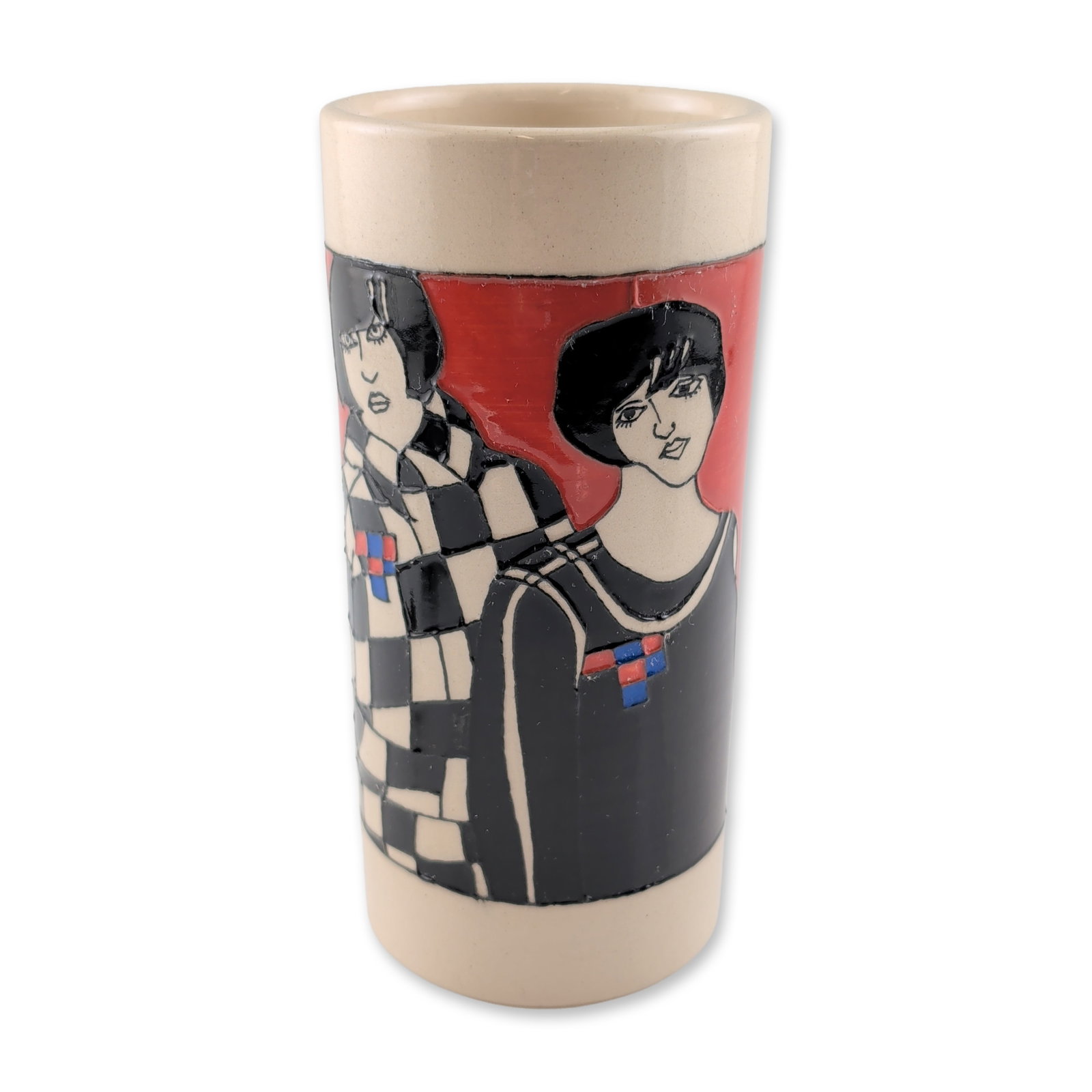 Dennis Chinaworks by Sally Tuffin Ceramic Vase: Cylindrical ceramic vase with cream gloss glaze and tube-lined decoration depicting two stylized female figures. Designed by Sally Tuffin, the motif features bold black outlines with red, blue, and bl