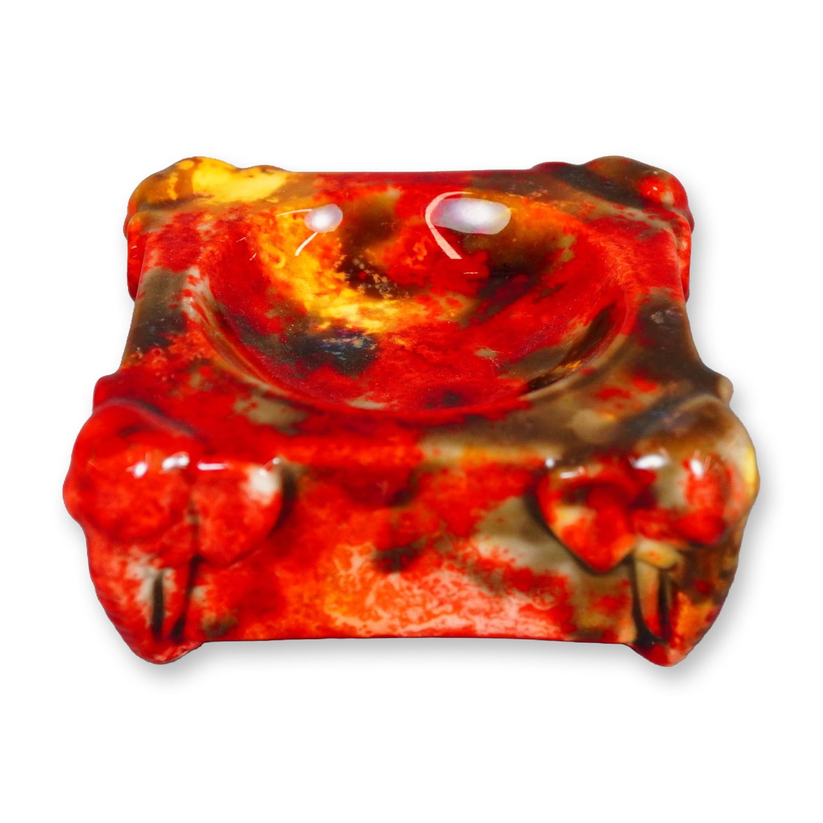 Royal Doulton by Fred Moore Flambe Porcelain Elephant Ashtray: High-fired flambe glaze in tones of red, yellow, and brown, with elephant heads at each corner. The underside bears the Royal Doulton Flambe mark and is signed by Fred Moore. Artist: Fred Moore Dimens
