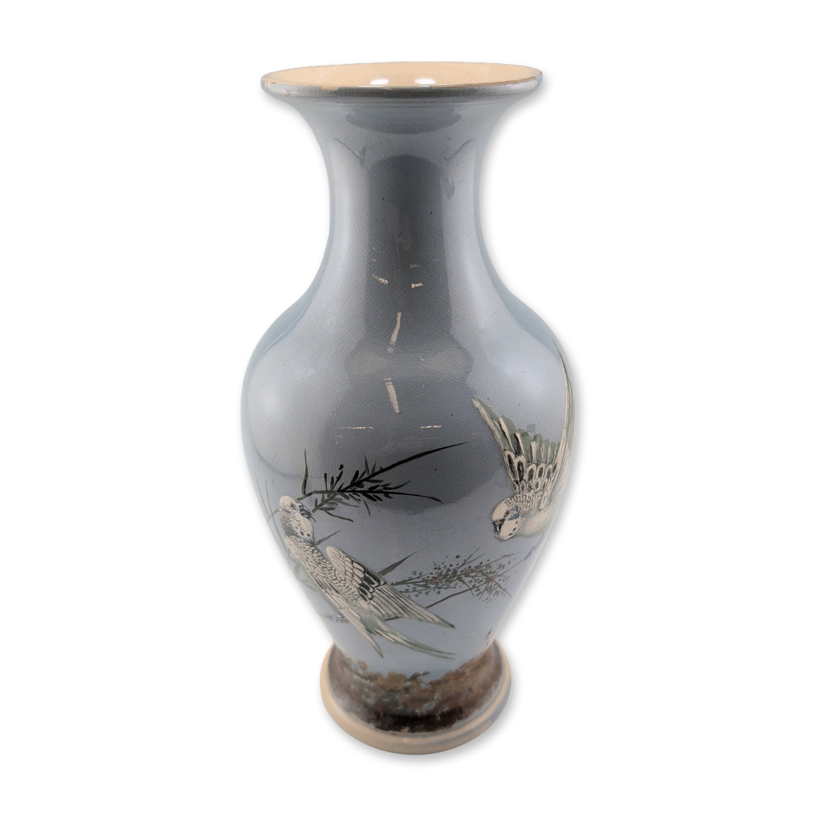 Royal Doulton by Florence Barlow Stoneware Bird Motif Vase: The vase features a baluster form with a flared rim. The body is decorated with a hand-painted pictorial scene depicting birds among stylized bamboo and grasses against a shaded blue-gray ground. The 