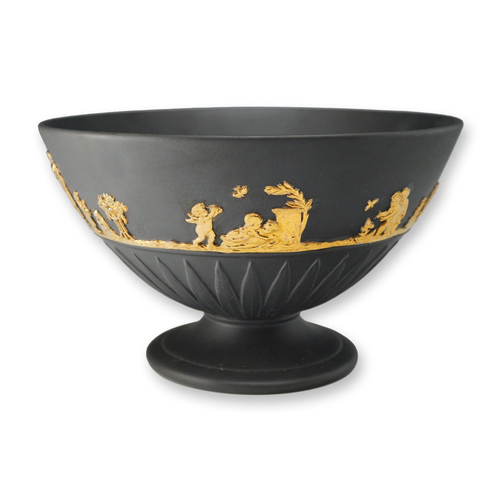 Wedgwood Black Basalt and Gilt Footed Bowl Artist's Sample: A black basalt stoneware footed bowl by Wedgwood featuring gilded neoclassical relief decoration. The vessel is designed with an inverted bell-shaped body supported by a circular pedestal foot. The ex