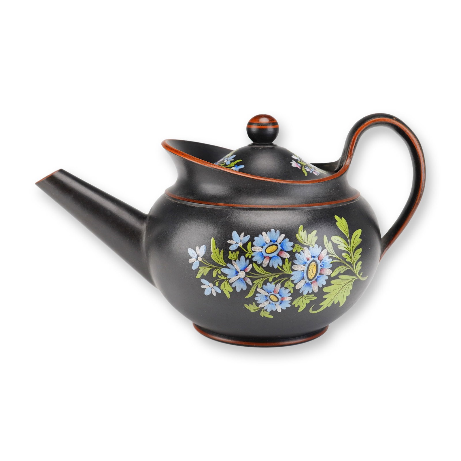 Wedgwood Black Basalt Capriware Floral Teapot with Lid: This Wedgwood black basalt teapot is an example of Capriware, featuring a fine-grained, unglazed black stoneware body. The vessel is decorated with hand-painted floral enamel sprays in shades of blue,