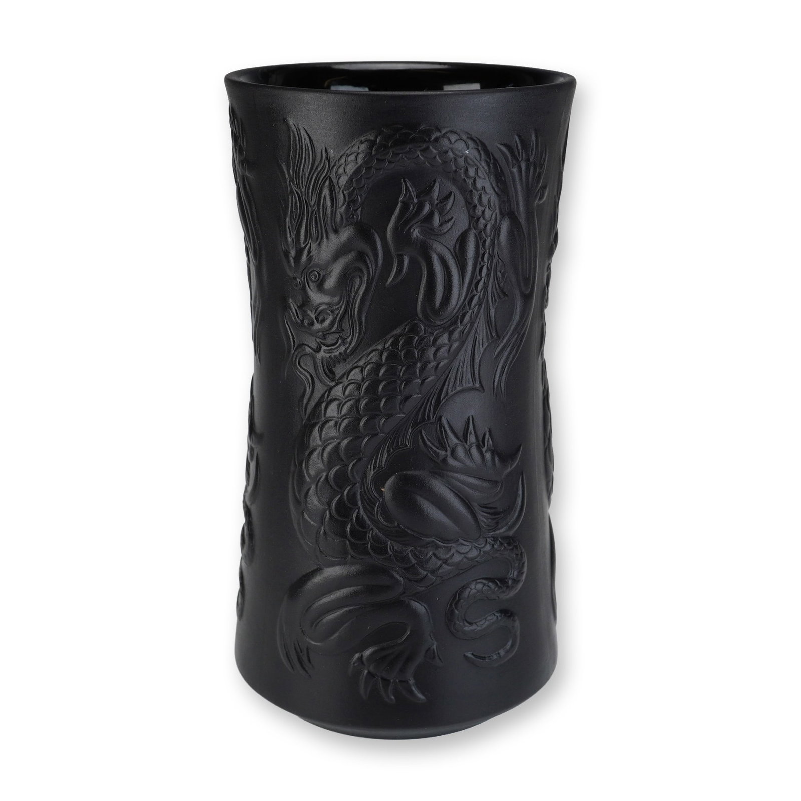Wedgwood Black Basalt Dragon Vase: This cylindrical vase is crafted from unglazed, matte black basalt stoneware by the Wedgwood factory in England. The exterior features a wrap-around motif of two five-clawed imperial dragons rendered 
