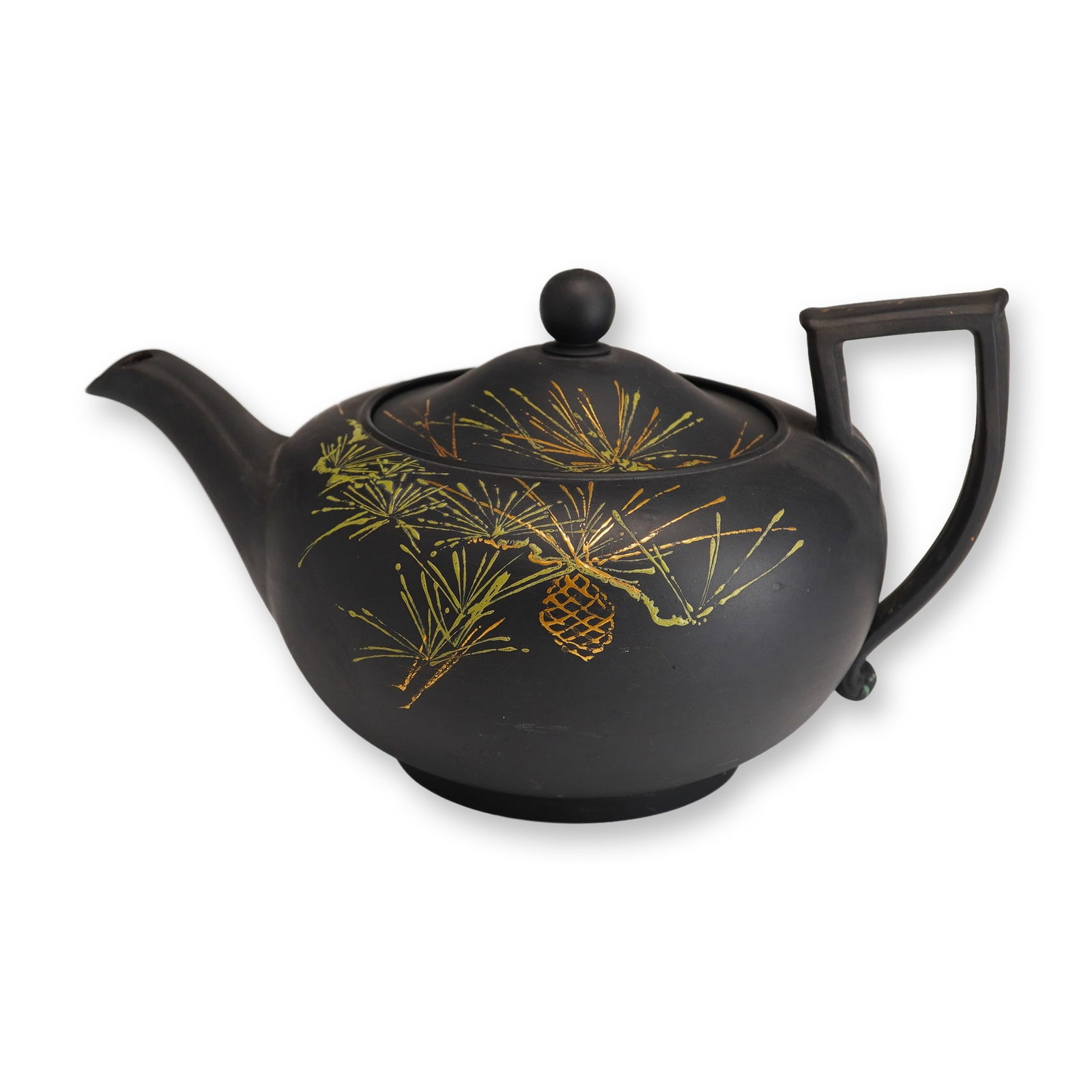 Wedgwood Black Basalt Japonisme Teapot with Bronzed Decoration: A Wedgwood black basalt teapot featuring hand-painted "bronzed" and enamel decoration in the Japonisme style. The globose, unglazed black stoneware body is decorated with a motif of stylized pine bran