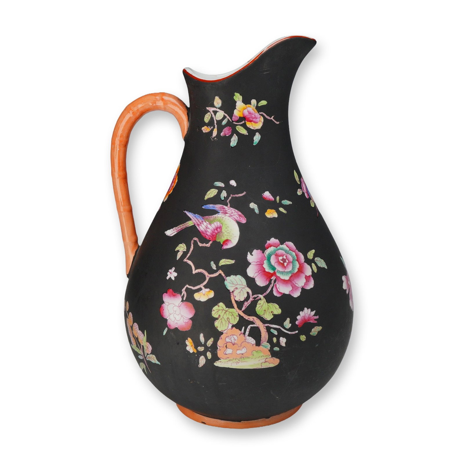 Wedgwood Capri Ware Black Basalt Pitcher with Polychrome Enamel Floral Decoration: This 19th century Wedgwood pitcher is crafted in black basalt, a type of stoneware, and decorated in the Capri Ware style. The exterior features a matte black ground serves as the backdrop for vibrant