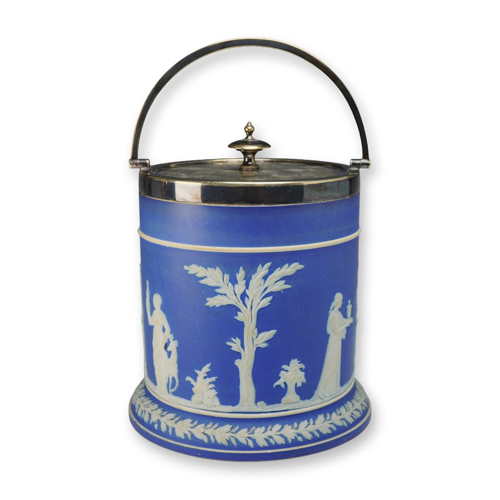 Wedgwood Cobalt Blue Jasperware Biscuit Jar with Silver-Plated Mounts: A Wedgwood cobalt blue jasperware biscuit jar featuring silver-plated mounts. The cylindrical vessel is composed of fine-grained unglazed stoneware with a dark blue jasper dip. The exterior is decorat