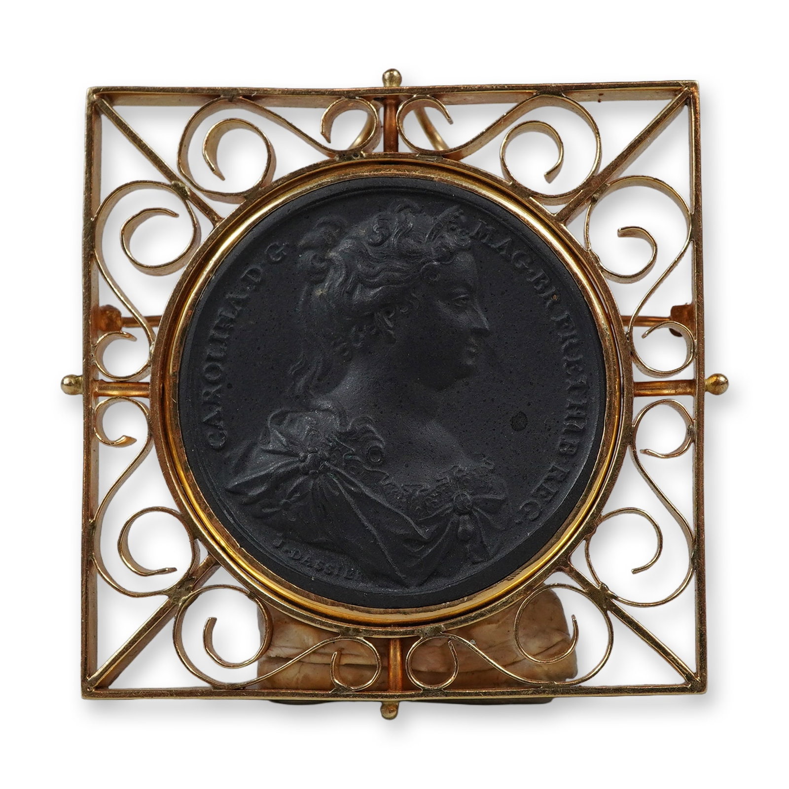 14K Yellow Gold Filigree Pendant Brooch with Black Basalt Medallion of Queen Caroline: This antique pendant brooch features a circular black basalt stoneware medallion depicting a profile portrait of Queen Caroline of Ansbach (1683"1737), consort of King George II of Great Britain. The 