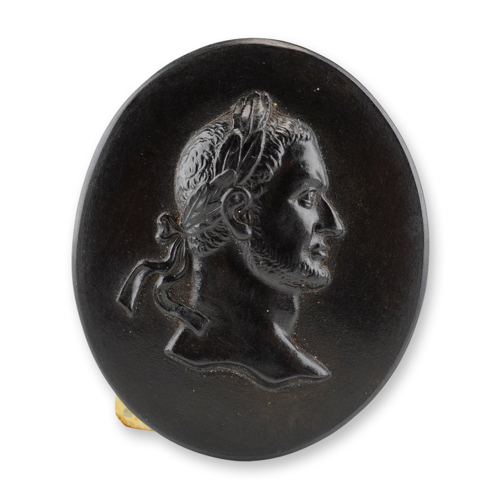 Wedgwood Black Basalt Portrait Medallion of Lucius Verus: A Wedgwood black basalt stoneware portrait medallion featuring a bas-relief profile of the Roman Emperor Lucius Verus. The subject is depicted facing right with a short beard and curly hair, wearing a