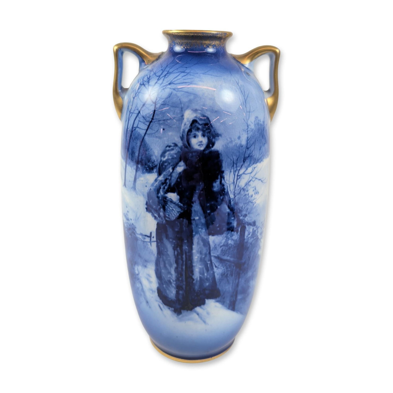 Royal Doulton Blue Children Series Porcelain Vase: Double-handled porcelain vase from the "Blue Children" series, featuring an underglaze blue scene of a young girl in Victorian winter attire within a snowy landscape. The vessel is designed with a