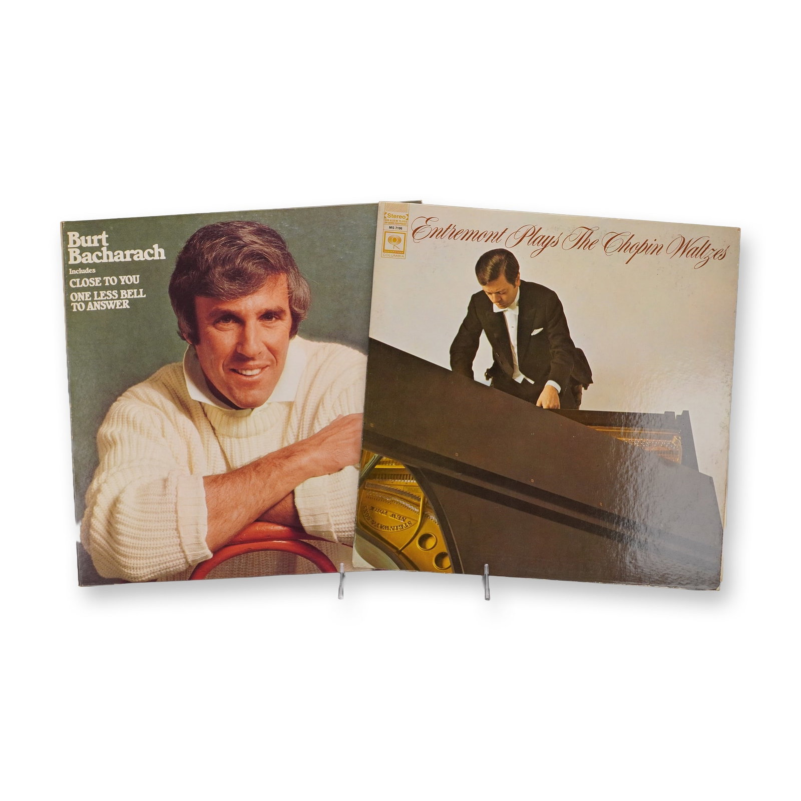 2pc Burt Bacharach and Entremont Plays Chopin Waltzes Vinyl Records: This 2-piece group includes Burt Bacharach featuring songs such as "Close to You" and "One Less Bell to Answer," along with Entremont Plays the Chopin Waltzes released by Columbia Records. Both albums