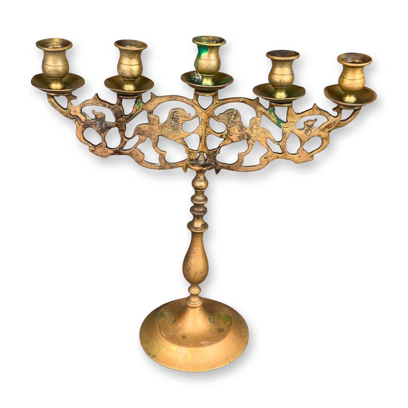Vintage Solid Brass Five-Light Lions of Judah Candelabrum Menorah: This five-light candelabrum is constructed from solid cast brass and features traditional Judaic motifs. The decorative horizontal arm is designed with pierced scrollwork flanking two central, confron