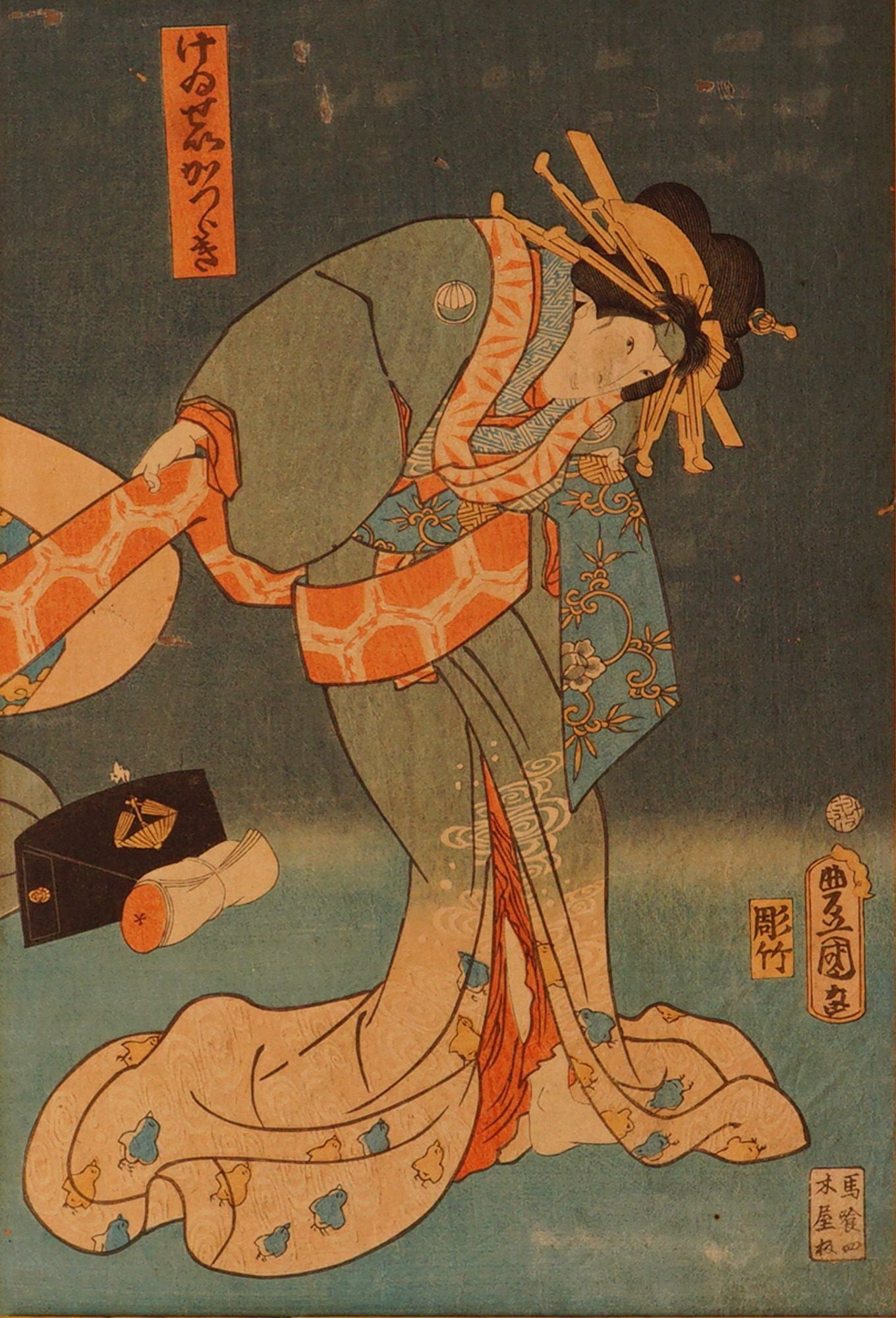 Japanese Woodblock Geisha Print on Paper: Depicting an elegantly dressed geisha in blue and coral tones, this print captures the refined grace and delicate linework associated with the Utagawa school and artists such as Toyokuni, admired for 