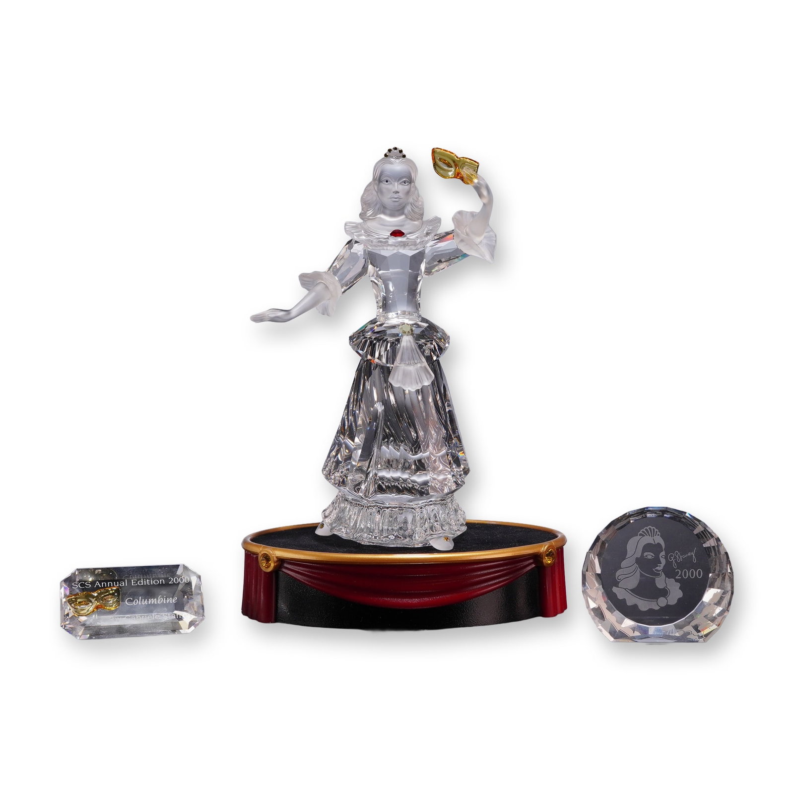 4pc Swarovski 2000 Annual Edition Columbine Figurine Set: Swarovski 2000 Annual Edition 242032 Columbine crystal figurine set, designed by Gabriele Stamey for the Masquerade trilogy. The set is composed of a faceted lead crystal figurine with frosted accents