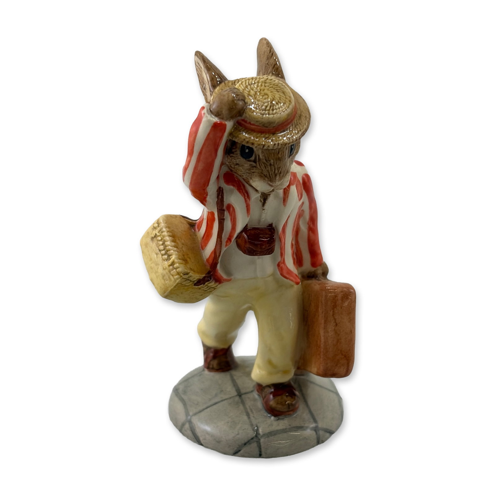 Royal Doulton Father Bunnykins DB154 Figurine: Royal Doulton glazed earthenware figurine titled Father Bunnykins, model DB 154. The figure portrays an anthropomorphic rabbit in travel attire, including a red and white striped blazer, cream trouser