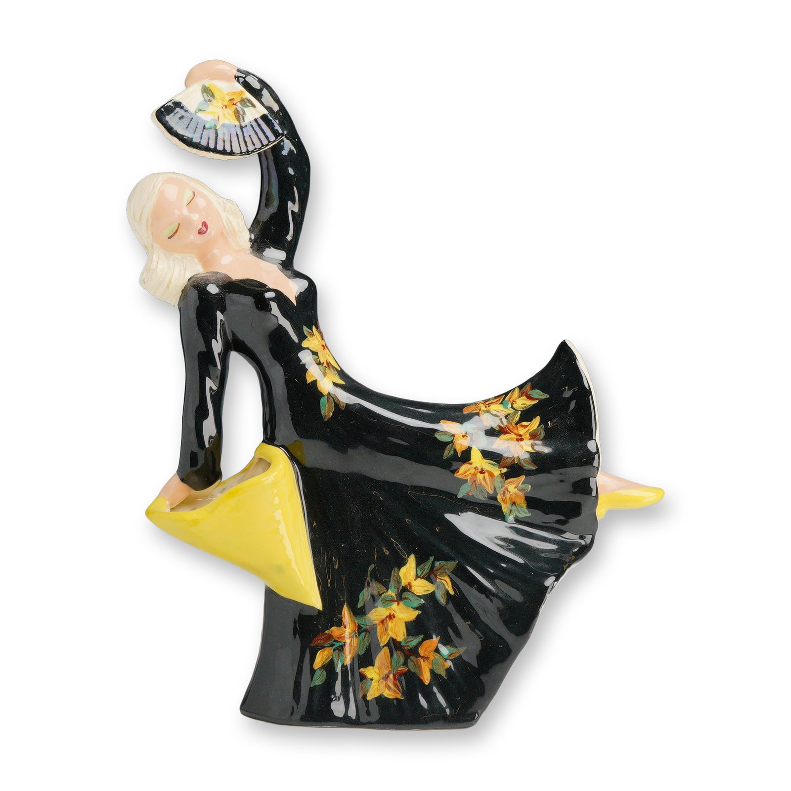 Hedi Schoop Hollywood Gal Figurine with Black Floral Dress and Fans: This glazed ceramic figurine is the Hollywood Gal model by Hedi Schoop. The Mid-Century Modern figure is depicted in a dynamic dancing pose, holding a decorated fan above her head with her right hand 