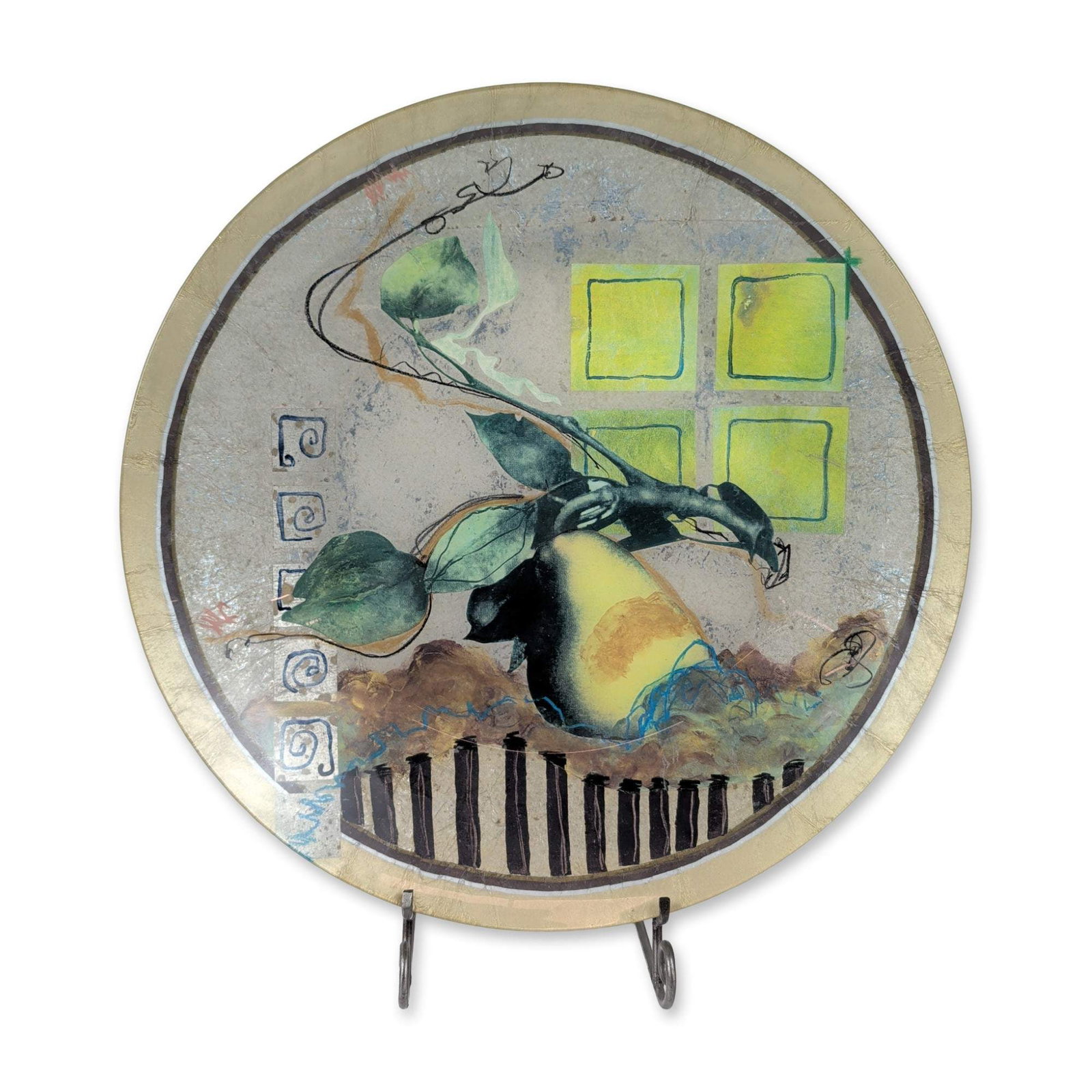 Susan Ward Art Glass Charger, Pear Square: Susan Ward (American). Hand-painted art glass charger titled Pear Square, featuring an abstract botanical composition with a central yellow pear and green leaves on a silvered ground. The design inclu