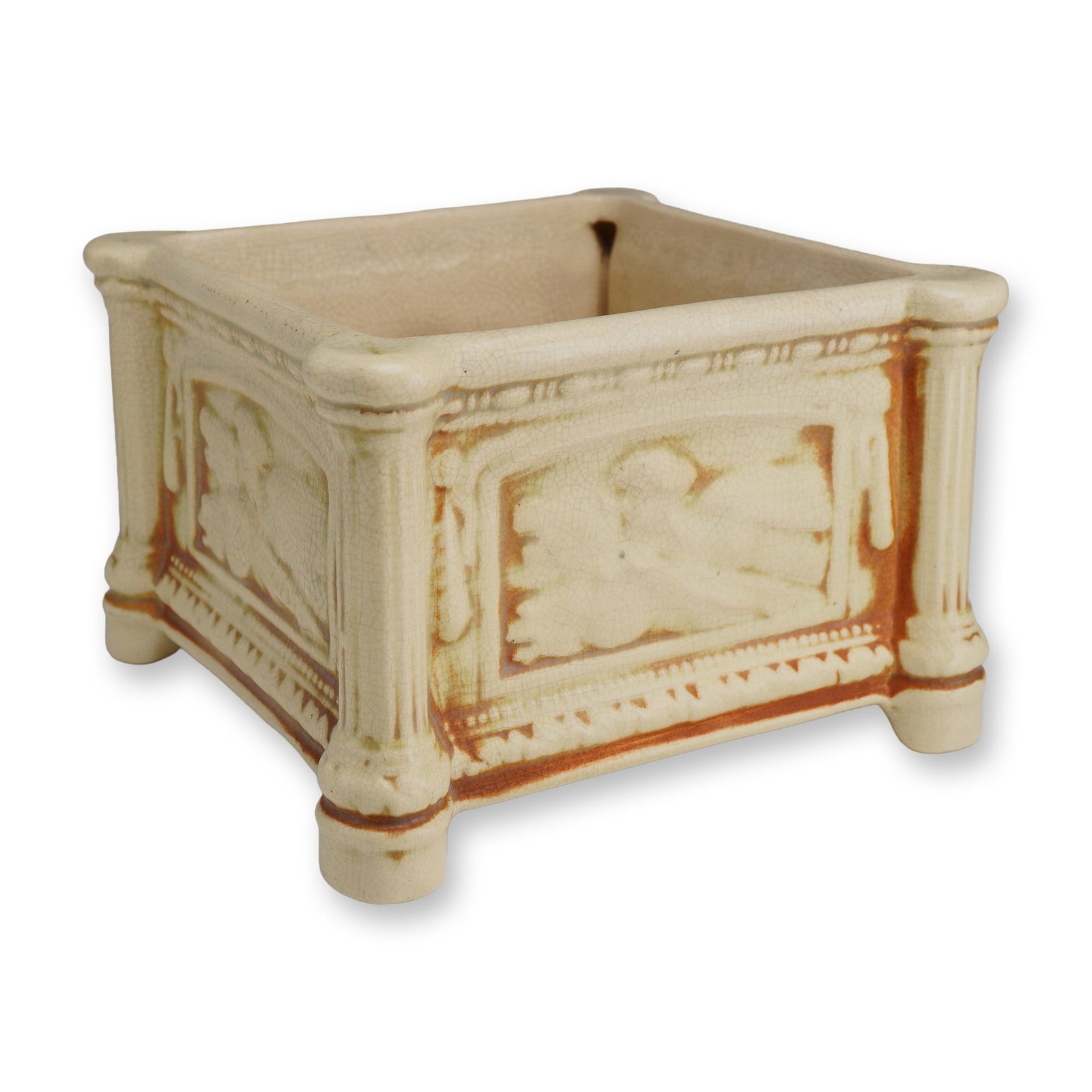 Weller Pottery Clinton Ivory Jardiniere: The Clinton line, produced by Weller Pottery in the 1930s, is known for its clean, sculptural forms and understated elegance. The Ivory variation is especially admired for its soft, neutral glaze and