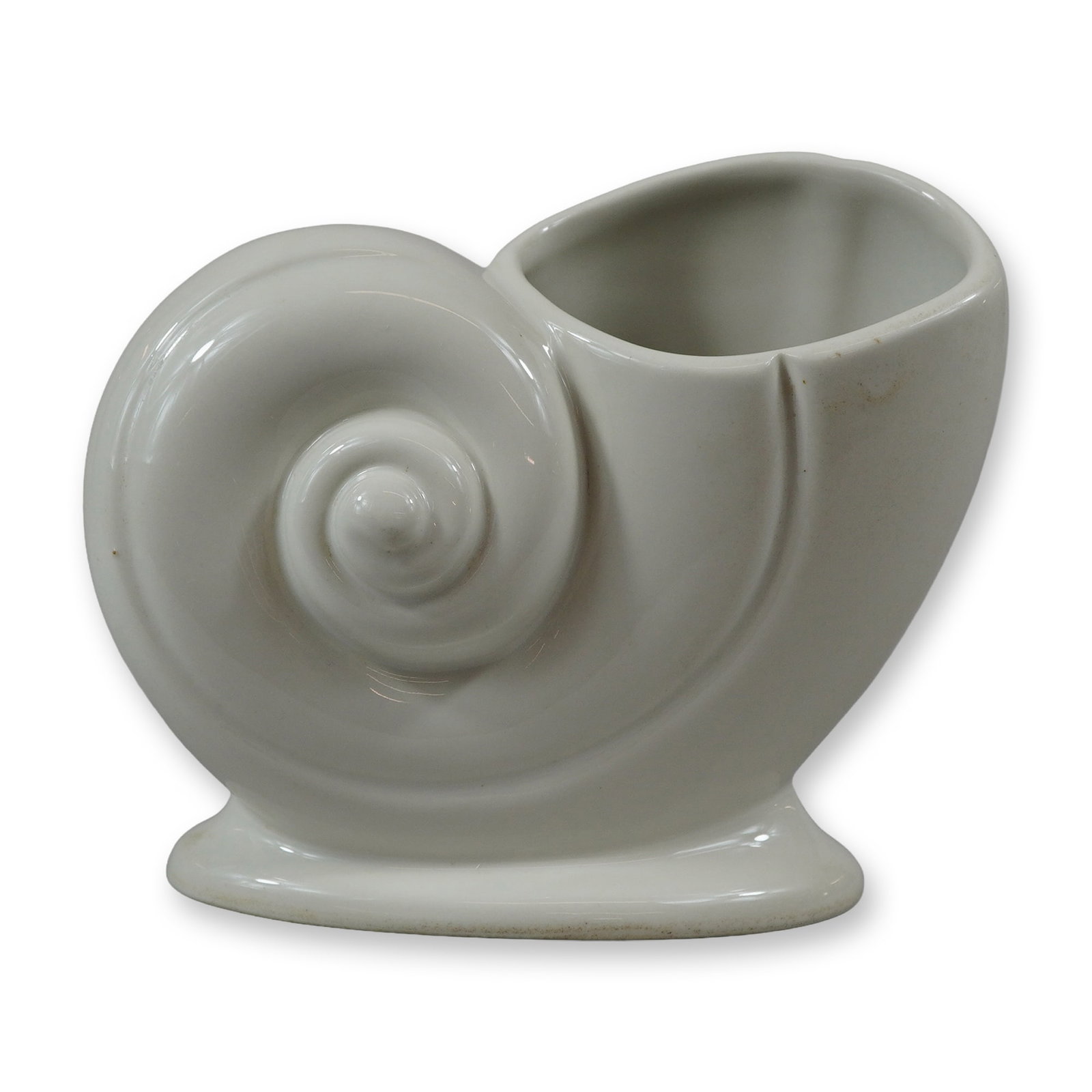 The Trenton Potteries Company White Glazed Ceramic Conch Shell Vase: A vintage white glazed ceramic vase or planter produced by The Trenton Potteries Company. The vessel is designed in the form of a nautilus or conch shell, featuring a spiral body that opens into a
