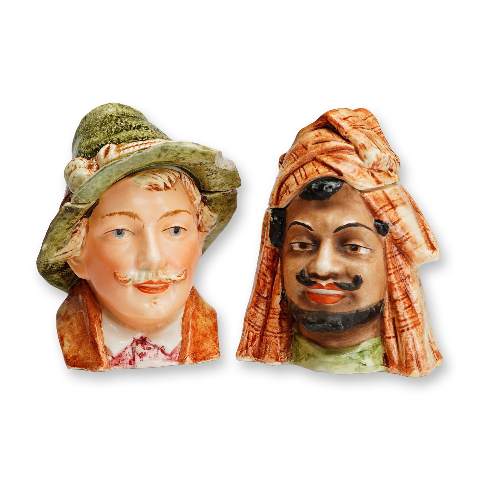 Pair of Majolica Continental Figural Ceramic Tobacco Jars Circa: A pair of antique figural tobacco jars or humidors, likely of Continental European origin, such as Austrian or German. Each vessel is crafted from molded earthenware featuring hand-painted polychrome
