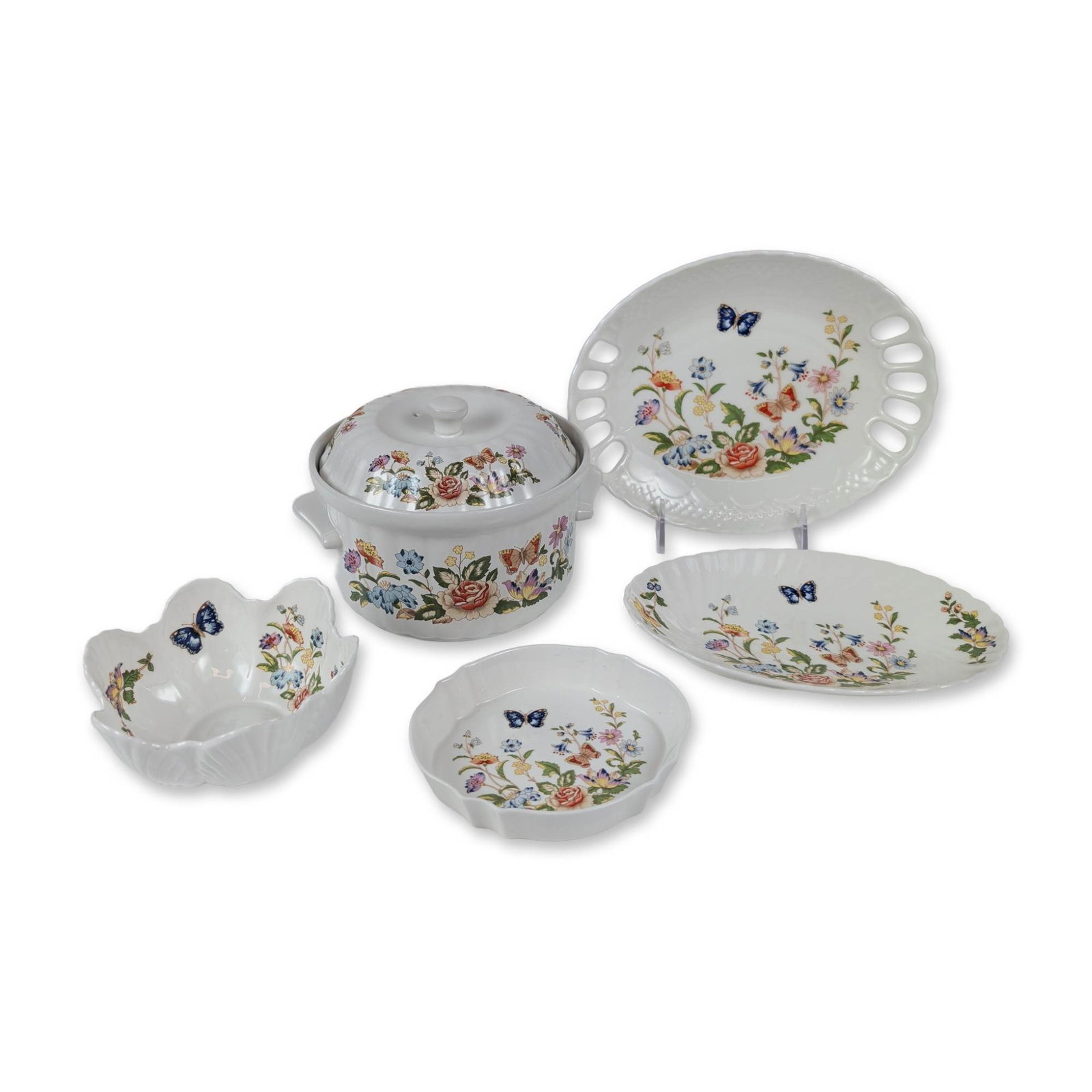 Five-Piece Collection of Aynsley Cottage Garden Tableware: The Cottage Garden pattern bursts with charm, featuring vibrant floral sprays and fluttering butterflies on a crisp white background. This delightful set includes a round lidded tureen with side