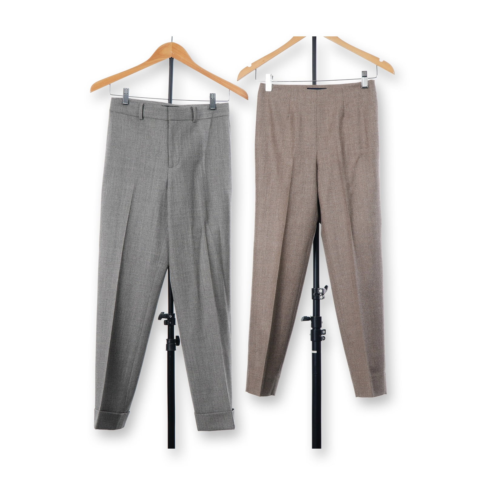 2pc Women's Designer Trousers by Ralph Lauren and Piazza Sempione: This lot features two pairs of designer women's tailored trousers. The first pair is by Ralph Lauren, crafted from a grey heather wool or wool-blend suiting fabric. The construction includes a front z