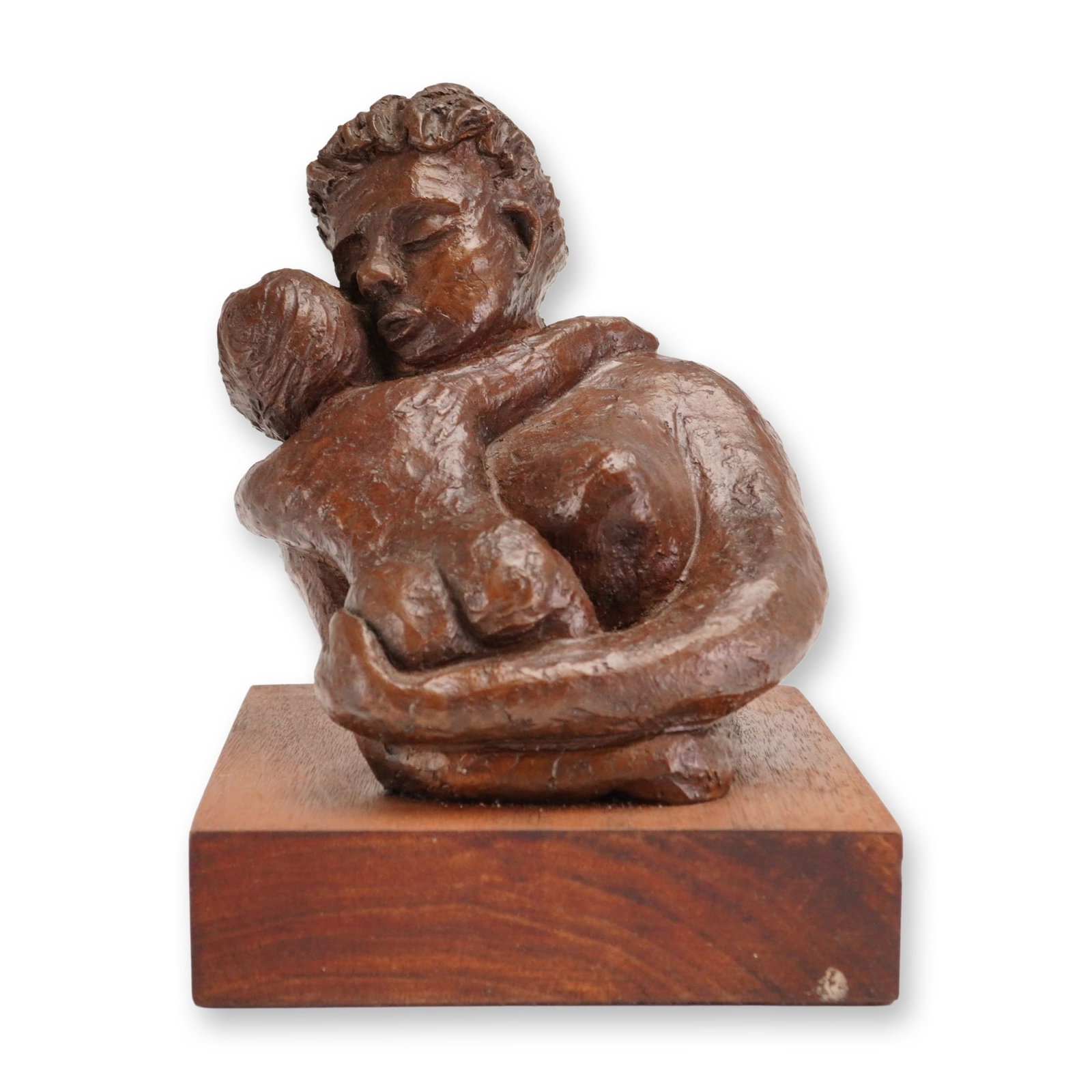 Kenneth Hari (American, b.1947) Mother and Child, Bronze Sculpture on Wooden Base, Edition 6/10: This modernist figurative bronze sculpture depicts a mother and child in a close, tender embrace. The work is characterized by a highly expressive and tactile surface with visible tool marks that