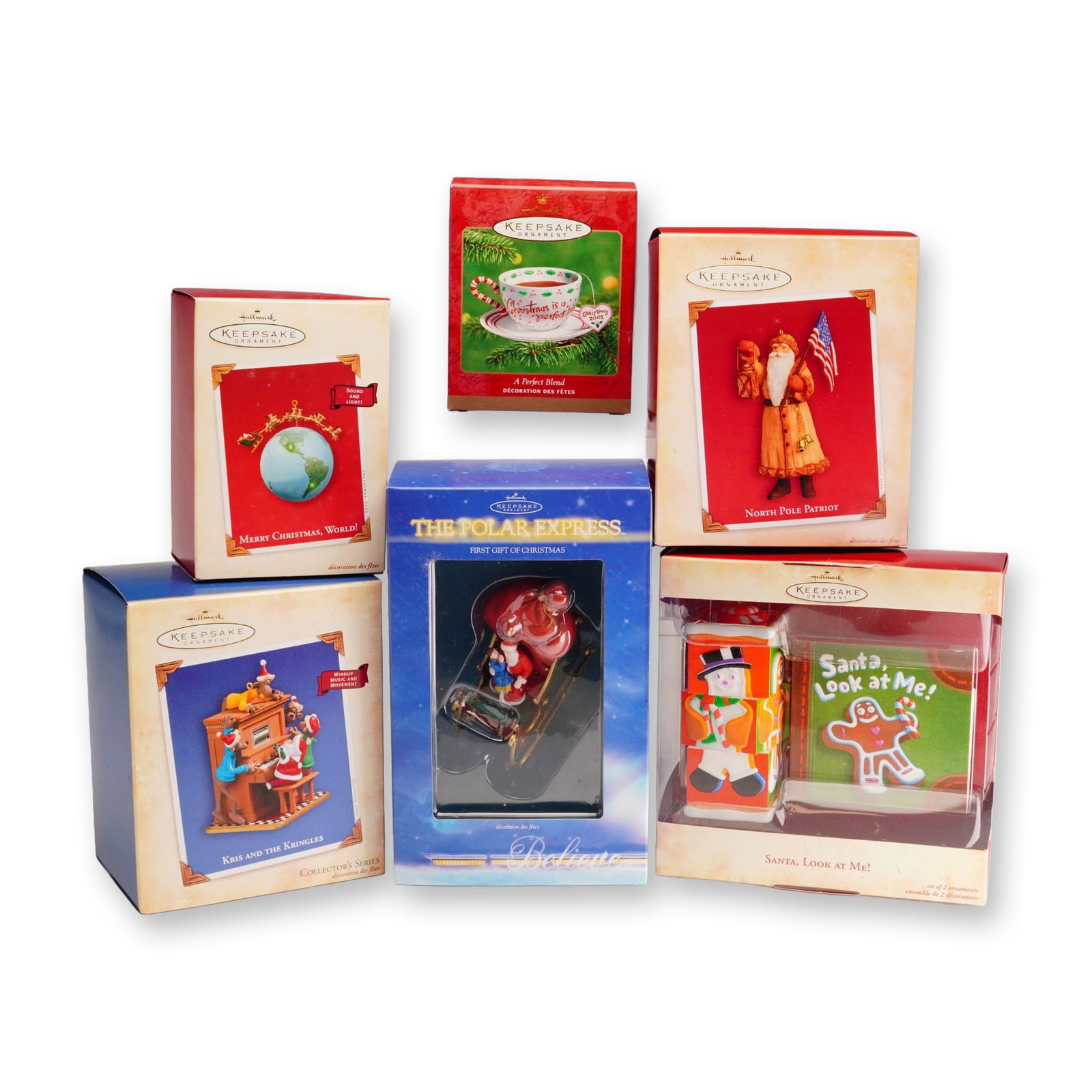 6pc Hallmark Keepsake Christmas Ornaments: This collection consists of six Hallmark Keepsake Christmas ornaments manufactured by Hallmark Cards, Inc. between 2001 and 2004. The items are constructed from handcrafted plastic and porcelain. Each
