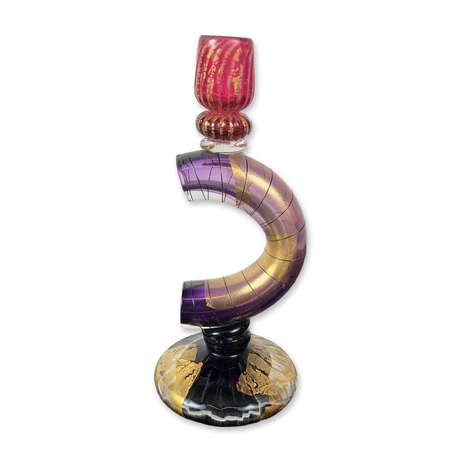 David Garcia Hand-Blown Studio Glass Candlestick: Hand-blown studio glass sculptural candlestick composed of multiple assembled components. The piece features a circular glass base infused with gold leaf, supporting a central pedestal and a U-shaped