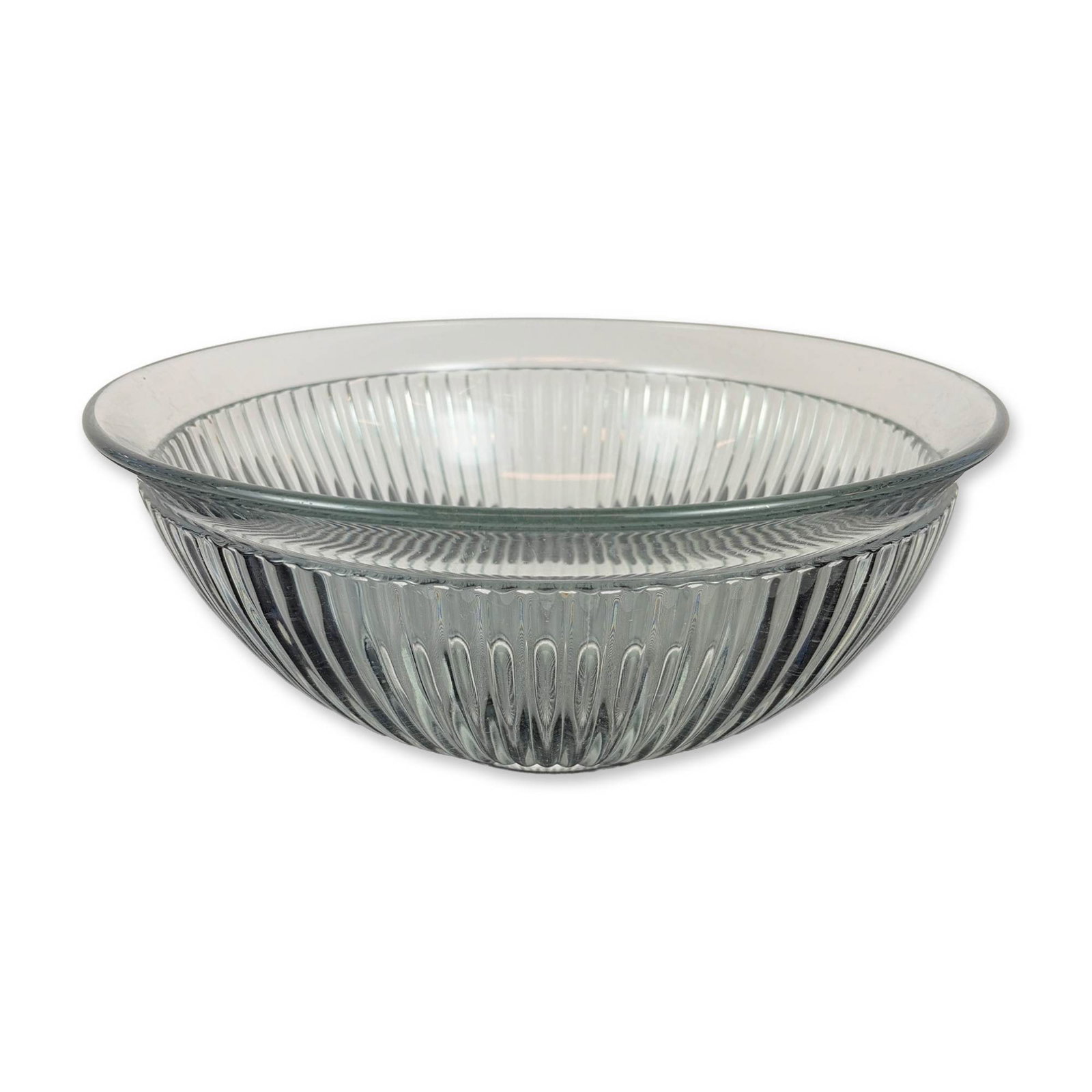 Sculpted Clear Ribbed Bowl: Mid-20th century style glass bowl featuring vertical prismatic ribbing and a central radiating starburst motif at the base. The flared form terminates in a smooth, rounded rim with small foot at