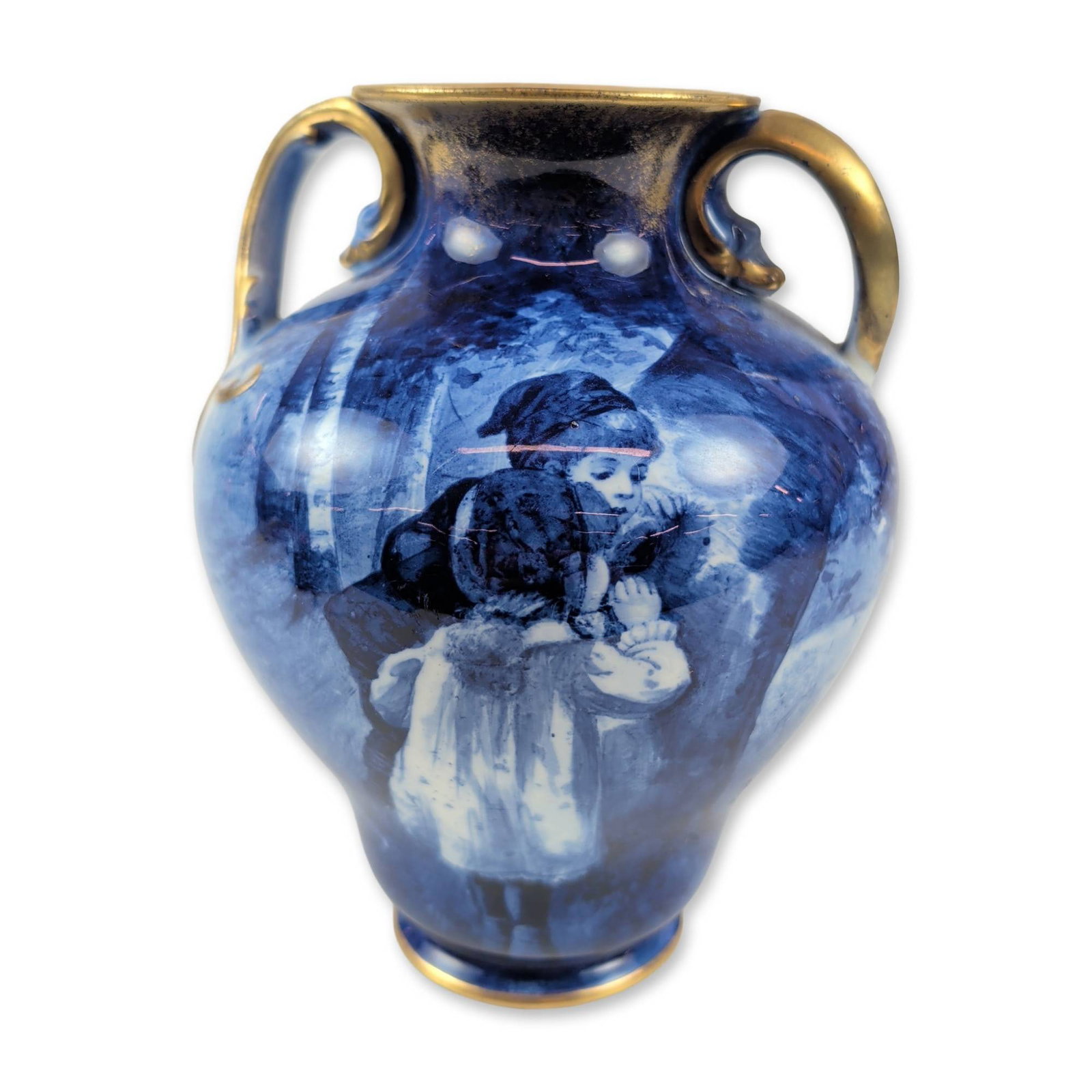 Doulton Burslem Blue Children Porcelain Handled Vase: Doulton Burslem English porcelain handled vase from the Blue Children series, featuring a blue landscape scene with figures and gilded handles, bearing a green Doulton Burslem backstamp on the