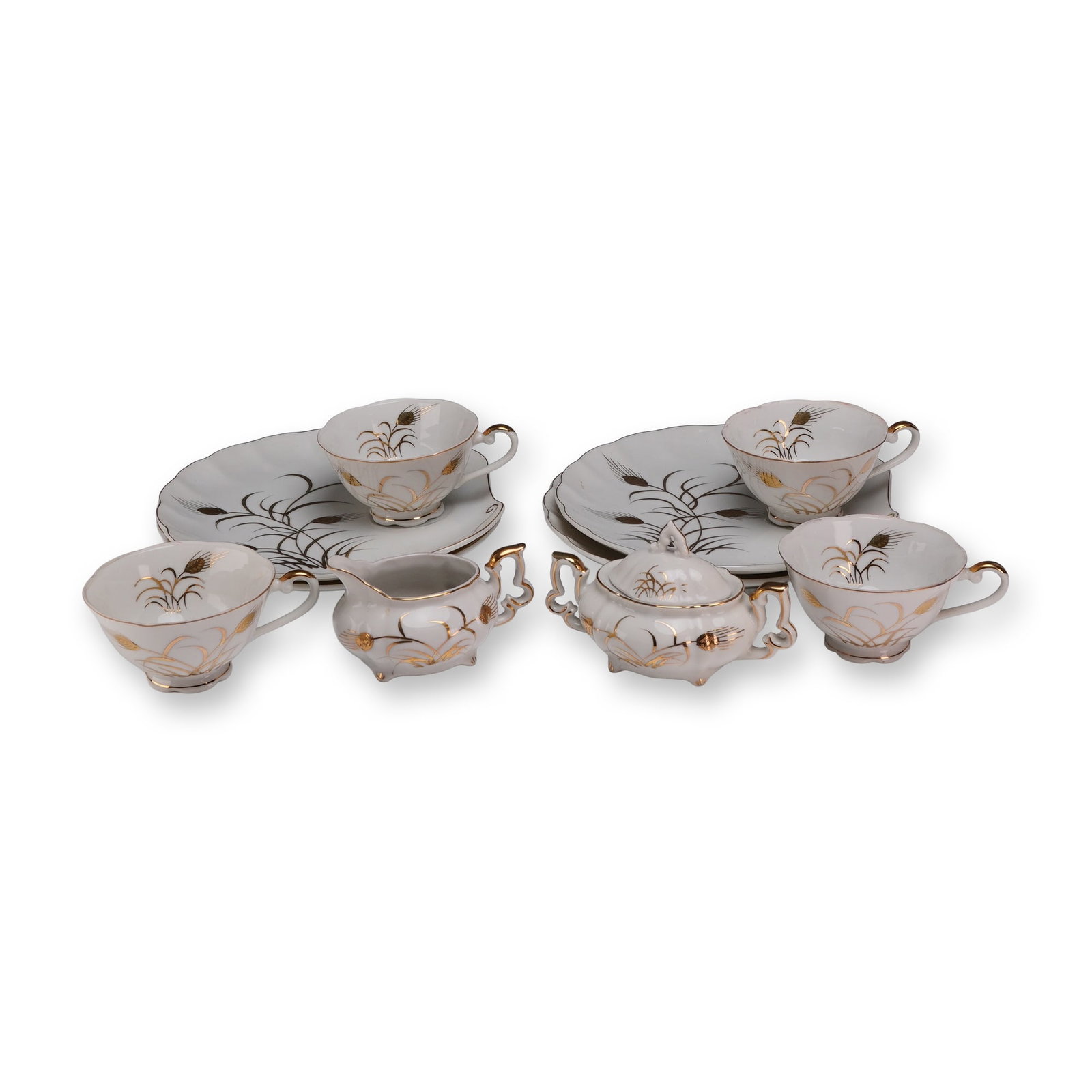 10pc Lefton China Gold Wheat Dessert Service- Cups, Plates, Cream & Sugar: Lefton China partial porcelain tea and snack service in the Gold Wheat pattern (NE 2768N). This hand-painted set features a stylized wheat motif with brown husks, black stems, and gilded grasses. The 