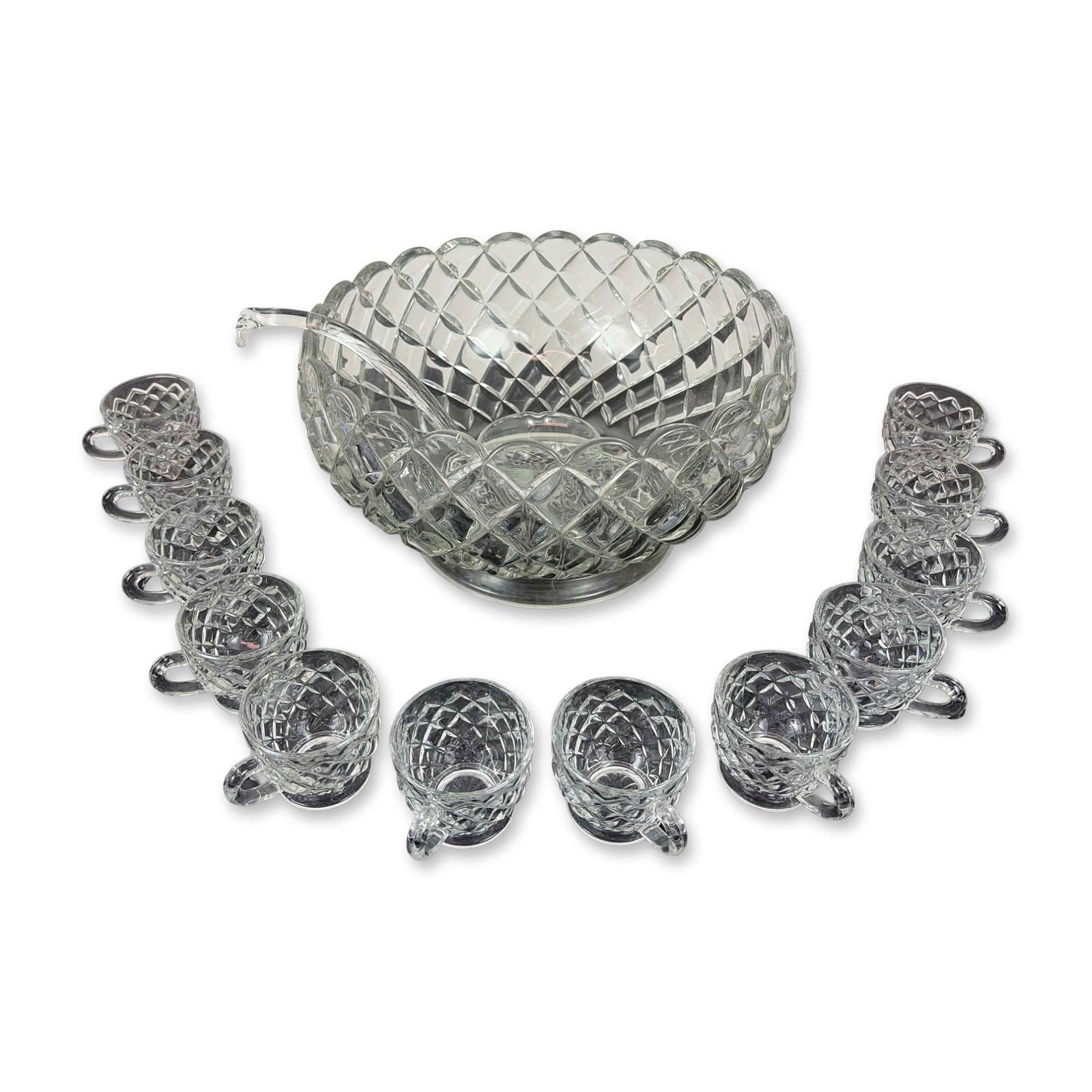 Fourteen Piece Pressed Glass Williamsburg Style Punch Bowl Set: Mid-20th century American style. Fourteen-piece punch set in clear pressed glass, featuring a diamond-point quilted pattern with scalloped rims. The collection includes a large punch bowl with a