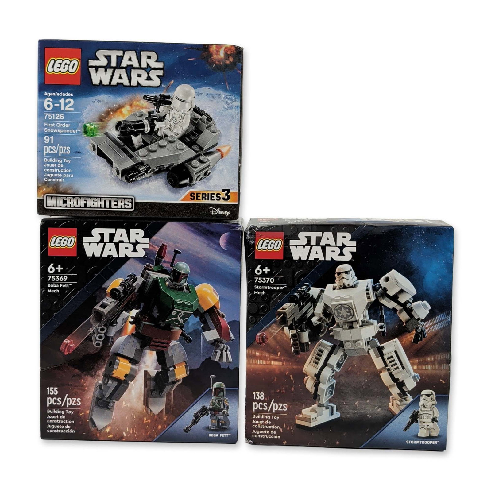 Three LEGO Star Wars Building Sets: The LEGO Group. Three Star Wars themed building sets in plastic, featuring set 75126 First Order Snowspeeder, set 75369 Boba Fett Mech, and set 75370 Stormtrooper Mech. Released between 2016 and 2023,