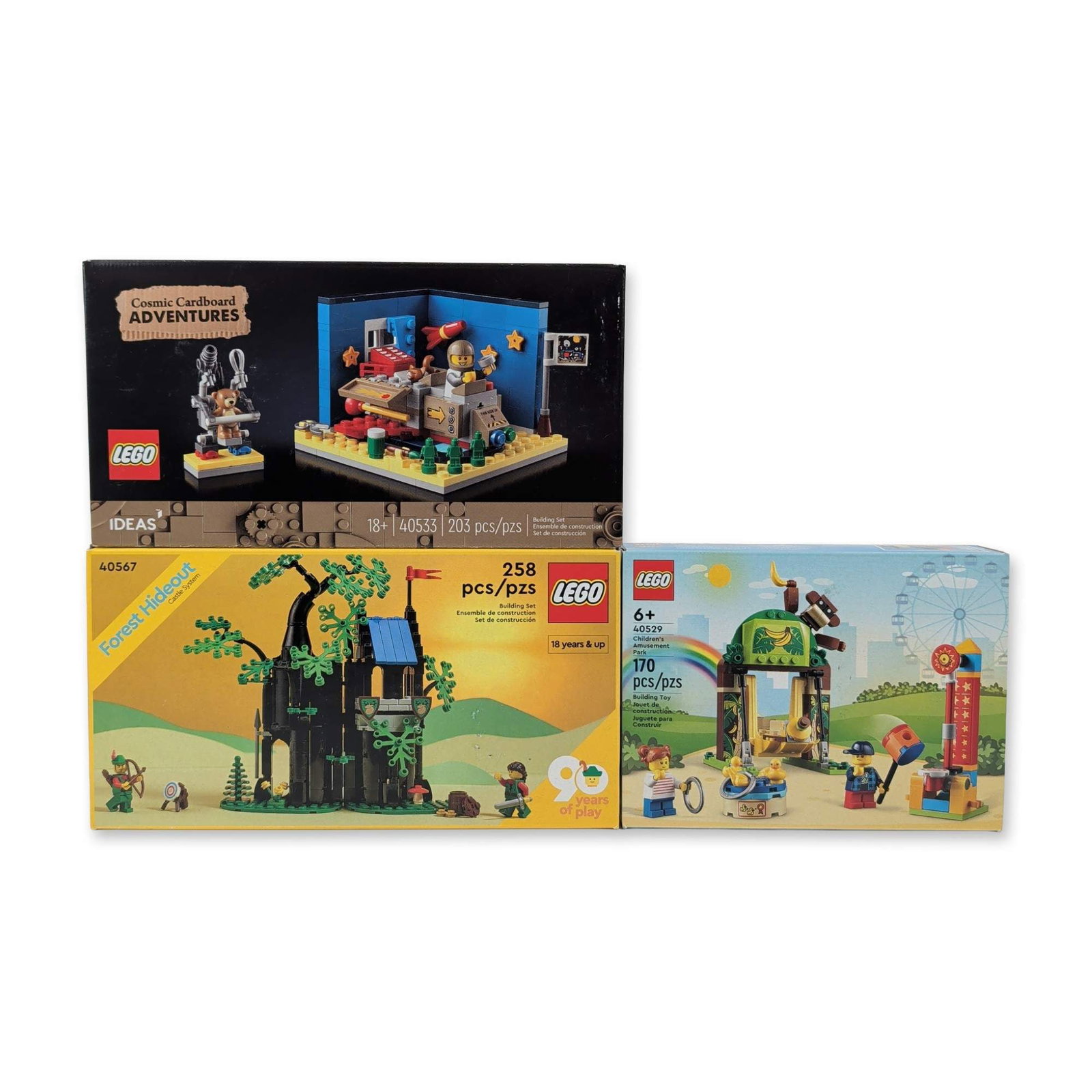 Trio of LEGO Promotional Building Sets: LEGO System A/S. Three promotional gift with purchase building sets. The collection consists of the Children's Amusement Park (Set 40529), featuring a 170-piece build with two child minifigures;